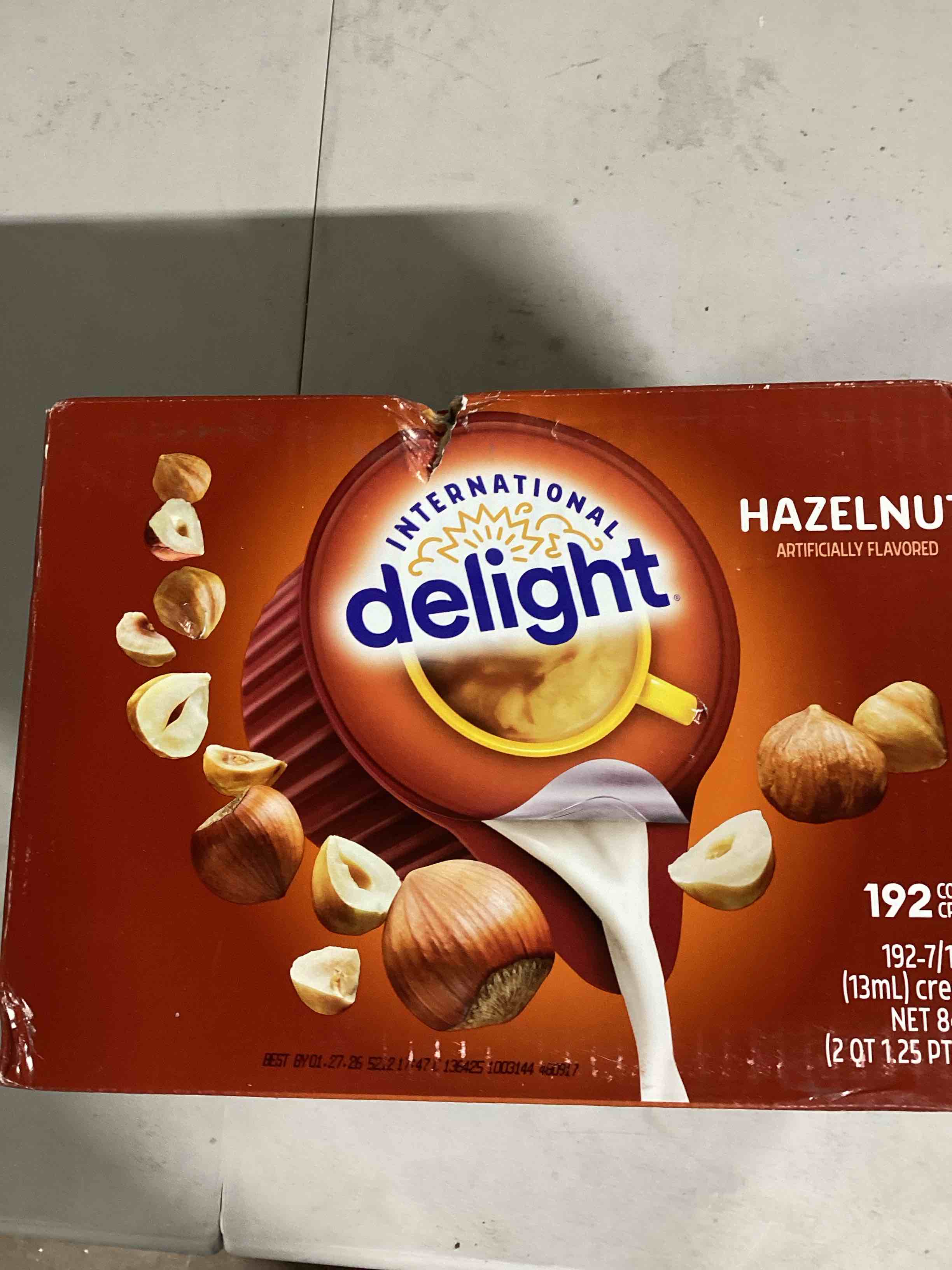 Condition photo showing New/Like New for International Delight, SingleServe Coffee Creamers Pack of 1 Shelf Stable NonDairy Flavored Coffee Creamer Great for Home Use Offices Parties or Group Events, Hazelnut, 192 Count, (Pack of 192) 192 Count (Pack of 1)