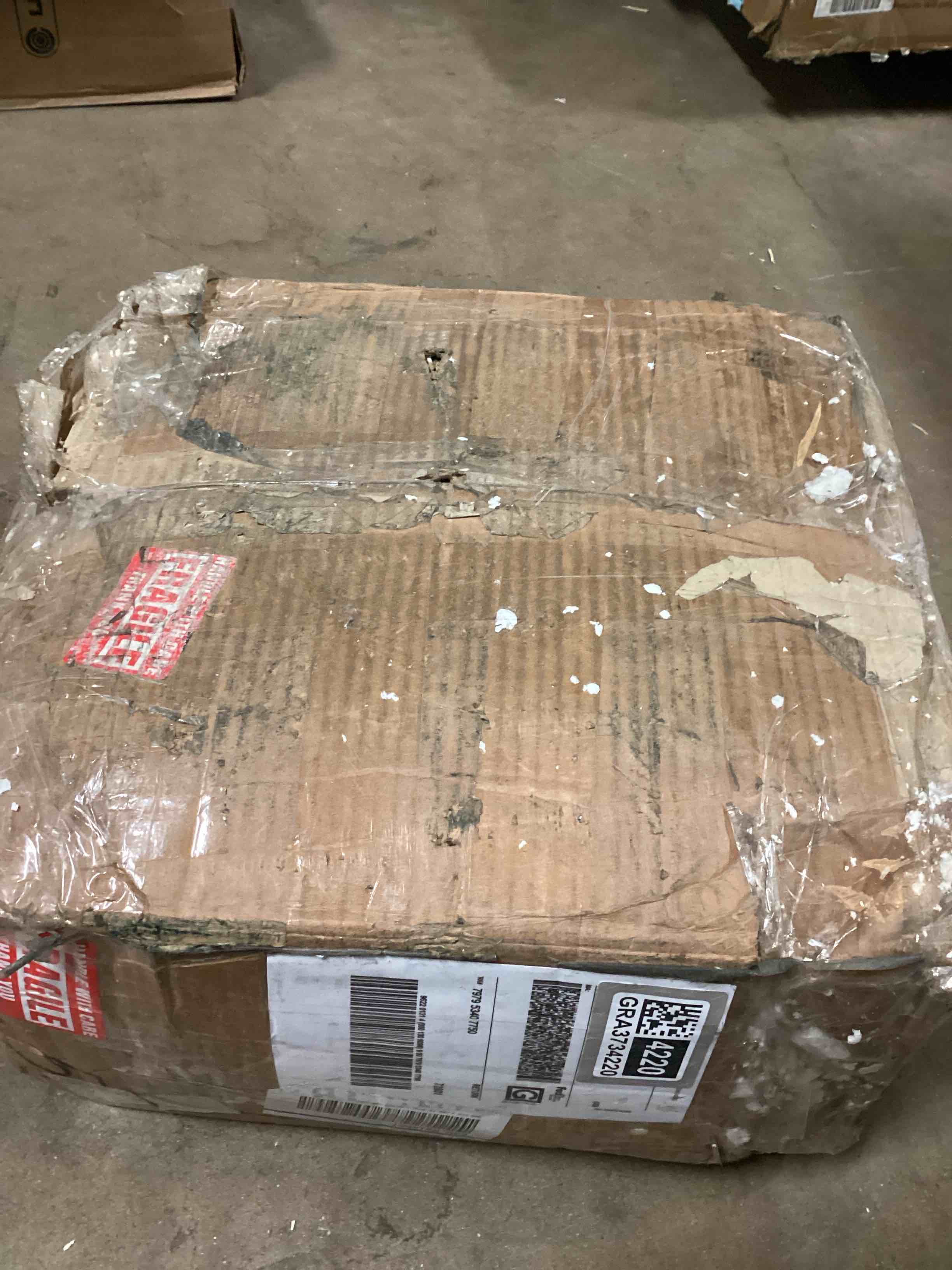 Condition photo showing As Is for (“ Broken Project Pieces Great for Mosaic Artists and Artwork “). (“Broken Regalia 12x12 Porcelain Veining Wall and Floor Tile (13.56 sq ft/case) - 14 Pack”)