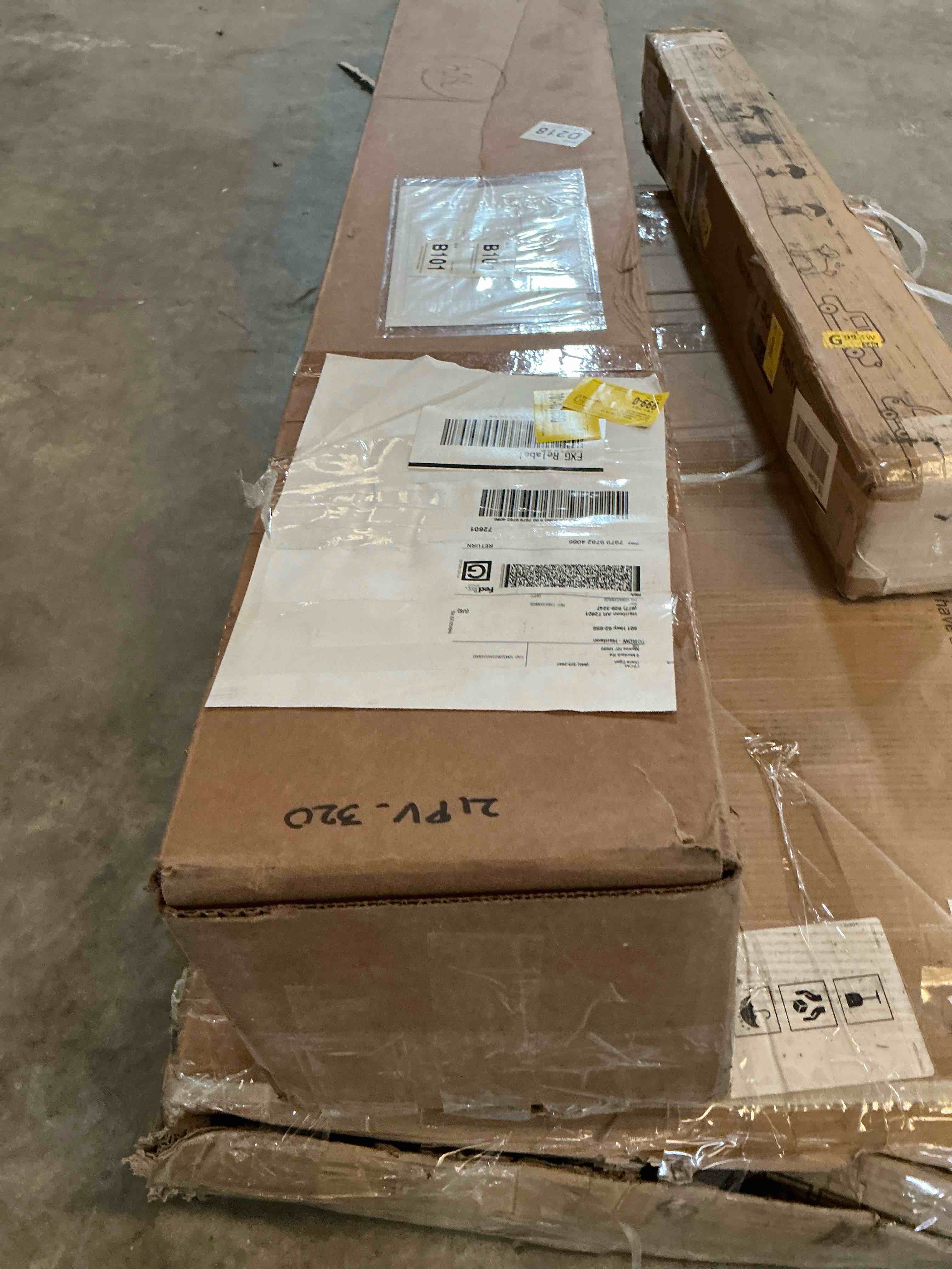 Condition photo showing As Is for (pot is broken)60'' faux fern tree in terra cotta planter