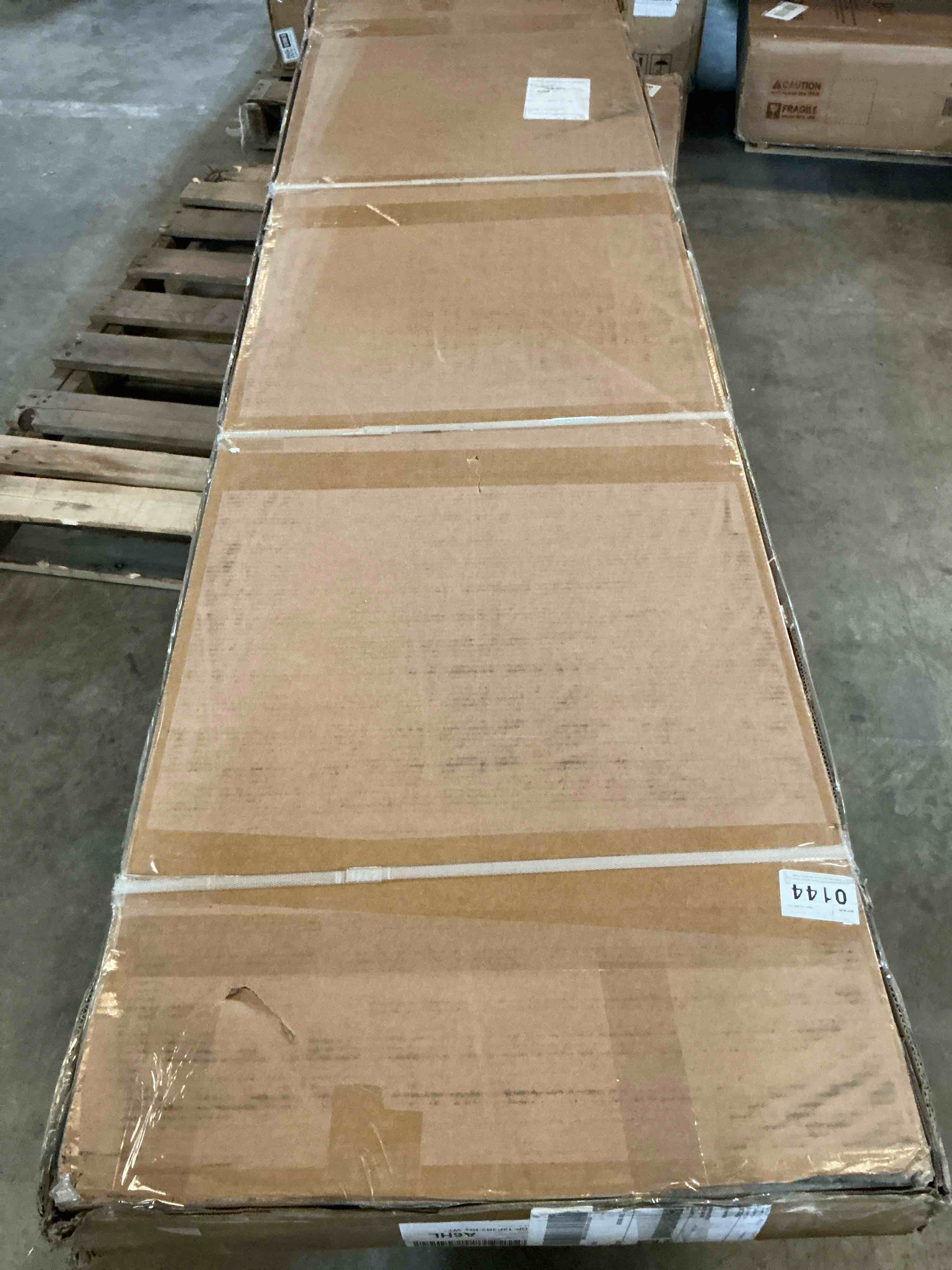 Condition photo showing Good Condition for double paneled manufactured wood primed bi-fold door with hardware kit