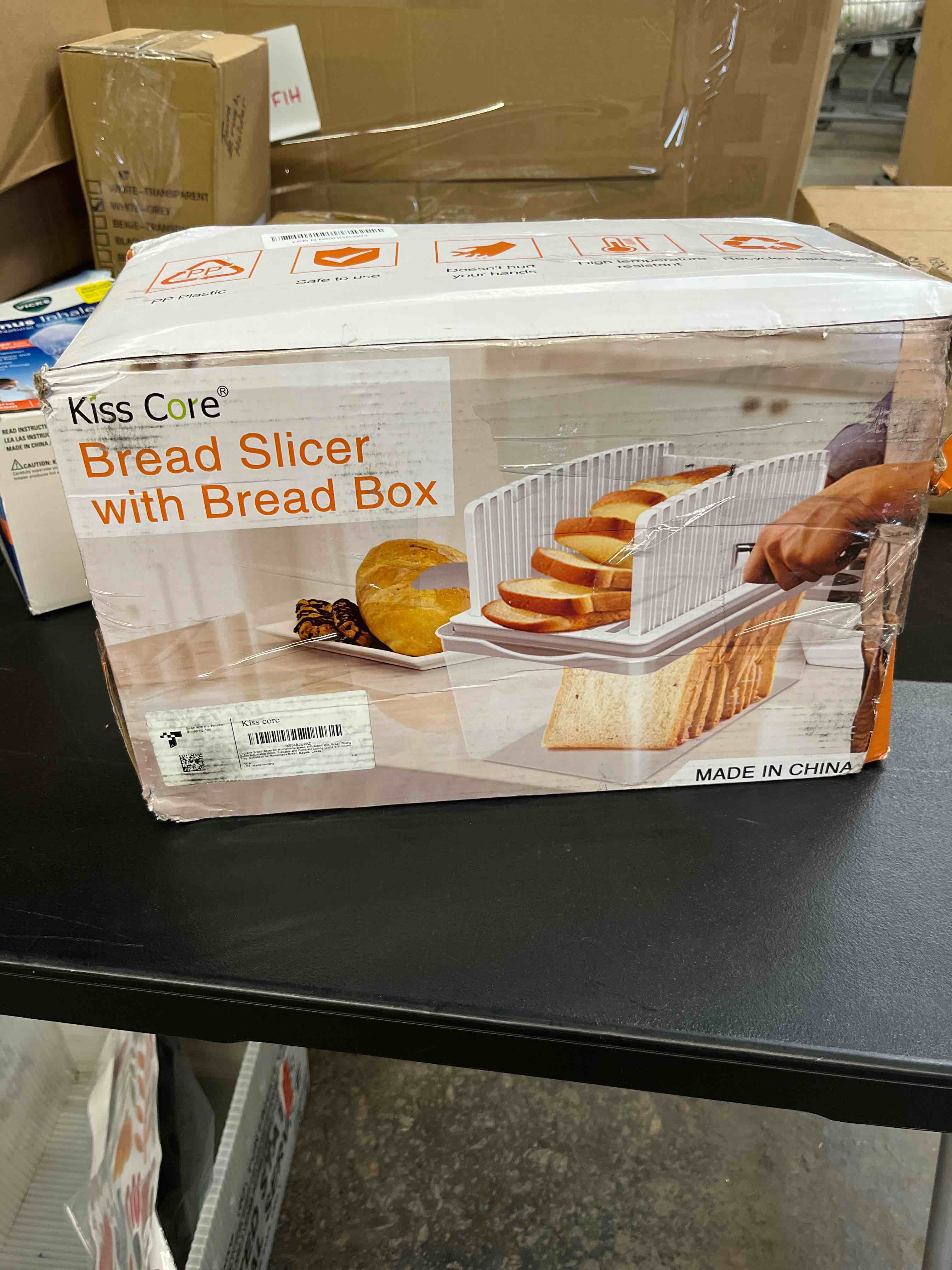 Condition photo showing Good Condition for upgrade bread slicer for homemade bread with bread box, bread slicing guide adjustable width, foldable and compact cutting guide with crumb tray, suitability for homemade bread, bagels,cakes bread slicer with box