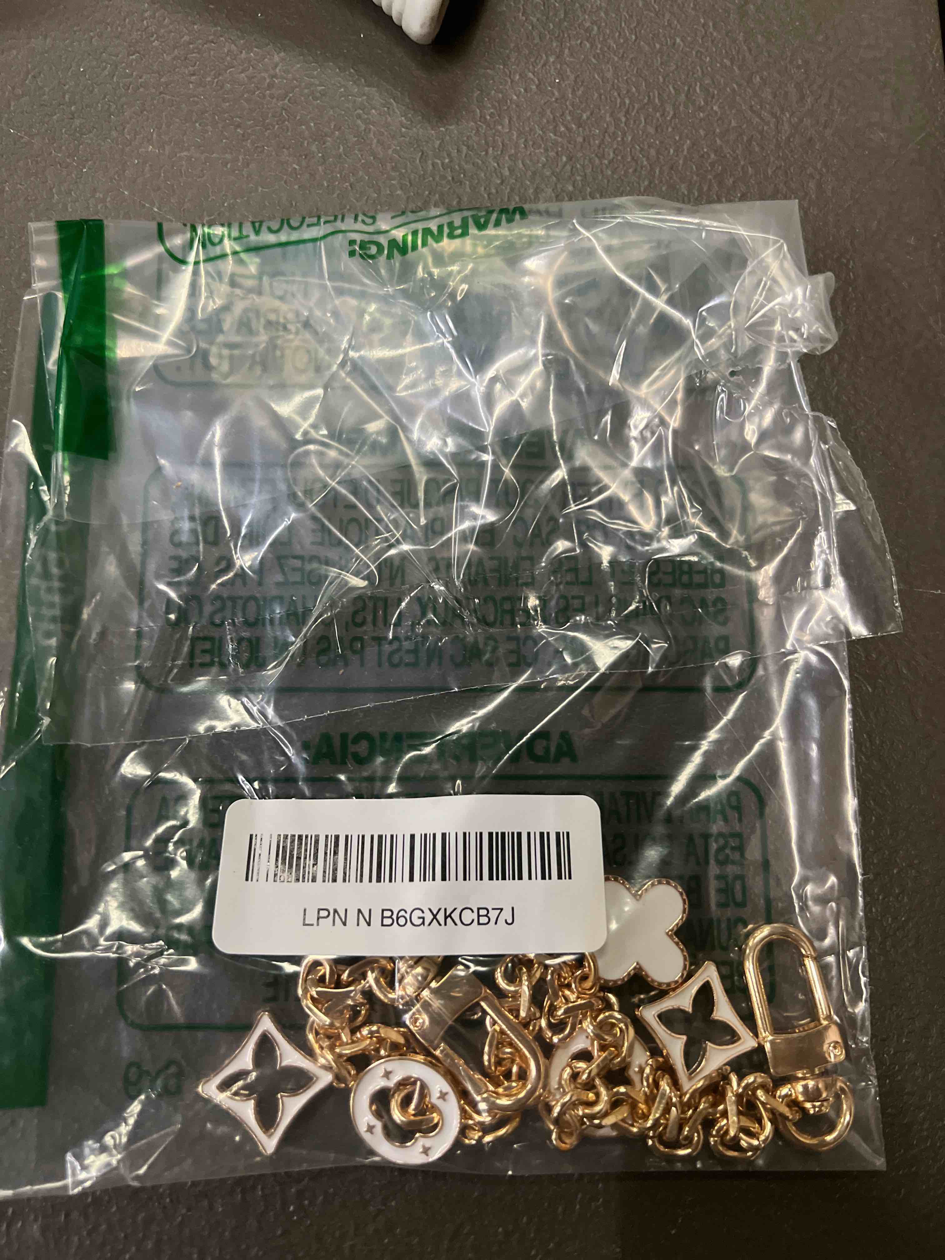 Condition photo showing Good Condition for Bag Charm Chain,Bag Charms for Handbags,Cute Purse Chains for Handbags,Bag Charms for Handbags,Designer Gold flower-shaped women's purse chain Black
