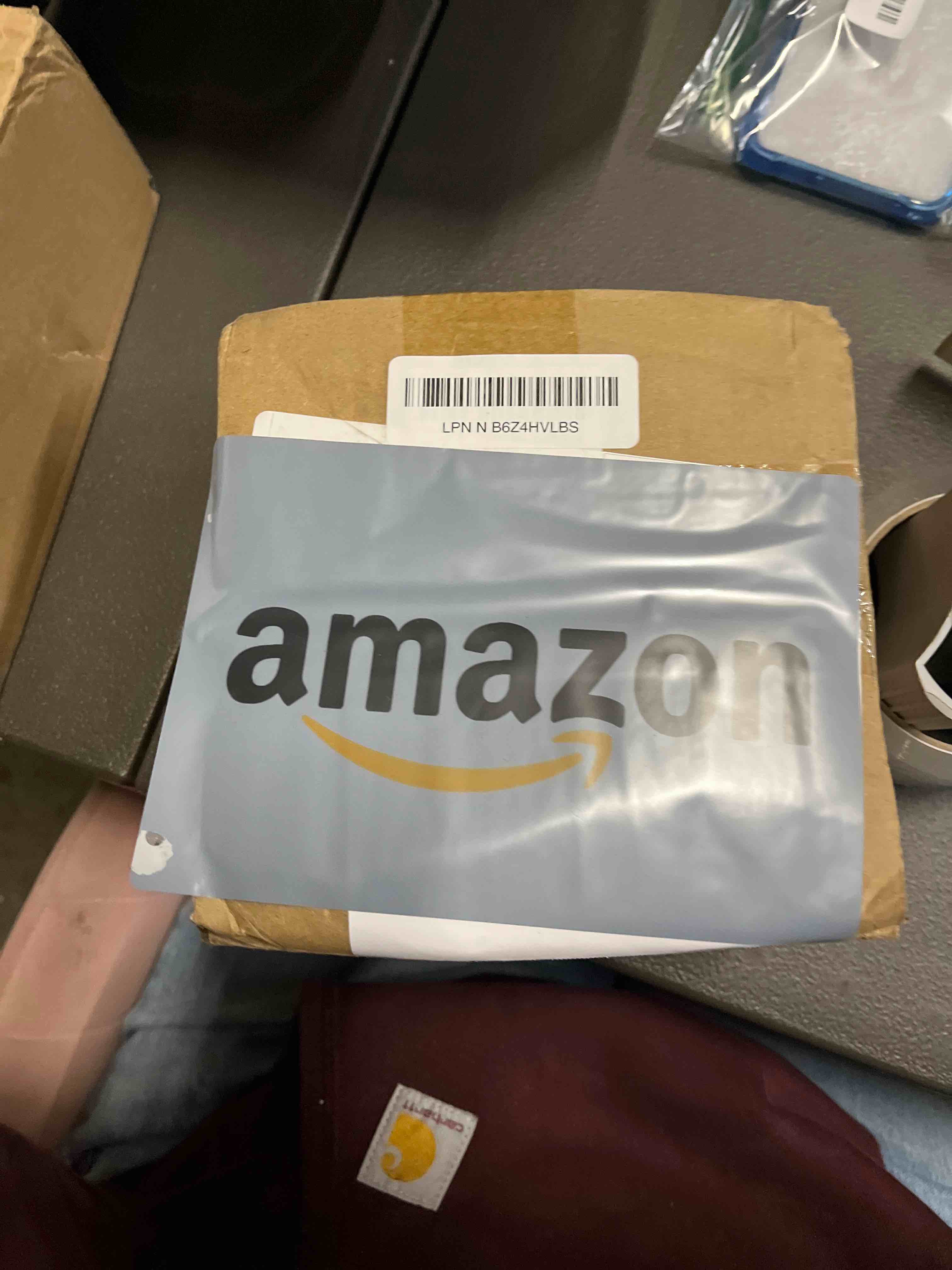 Condition photo showing Good Condition for Vinyl Baseboard Molding Trim 4 Inch x 20 Feet Peel and Stick Baseboard Trim Flexible PVC Cove Base Moulding Self-Adhesive Trim for Garage Bathroom Cabinet Floor Walls, Black 4Inch x 20Ft Black