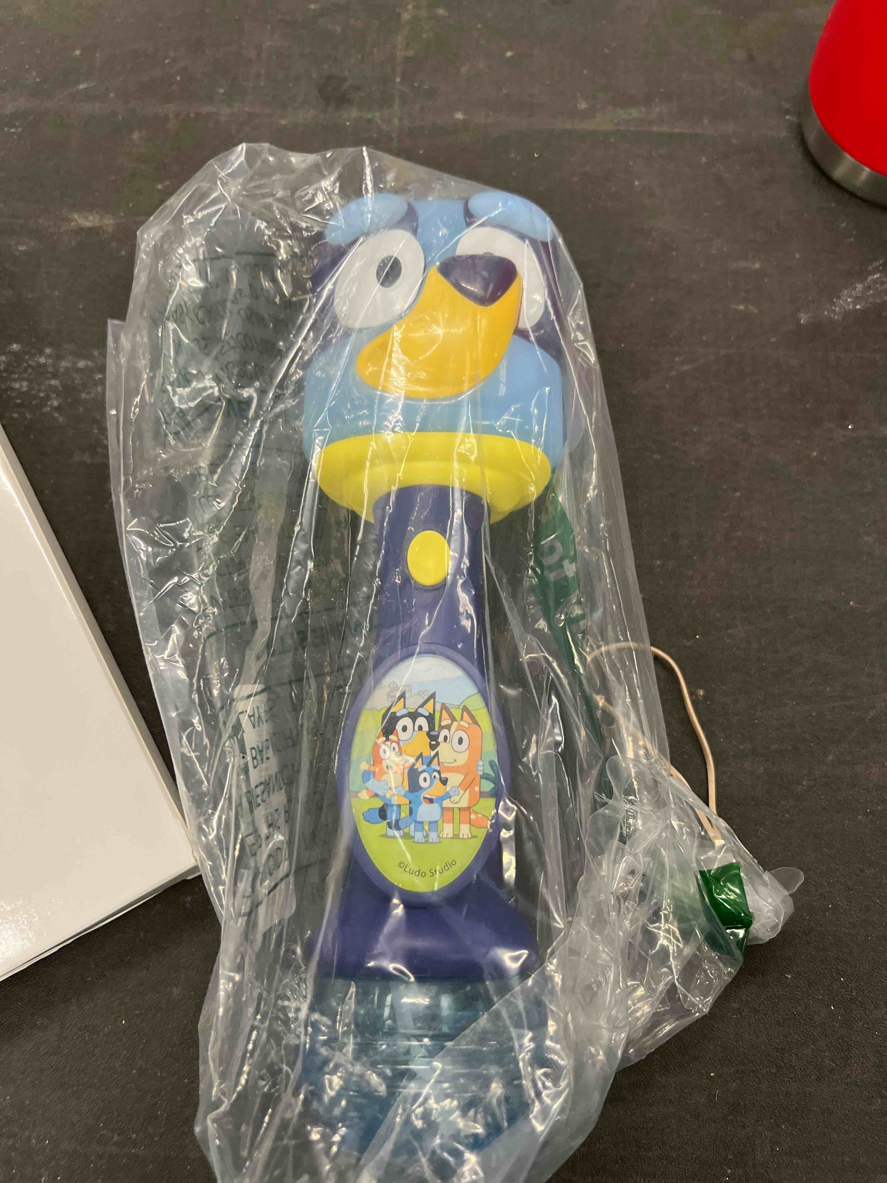 Condition photo showing Good Condition for little kids bluey light and sound musical bubble wand, includes bubble solution