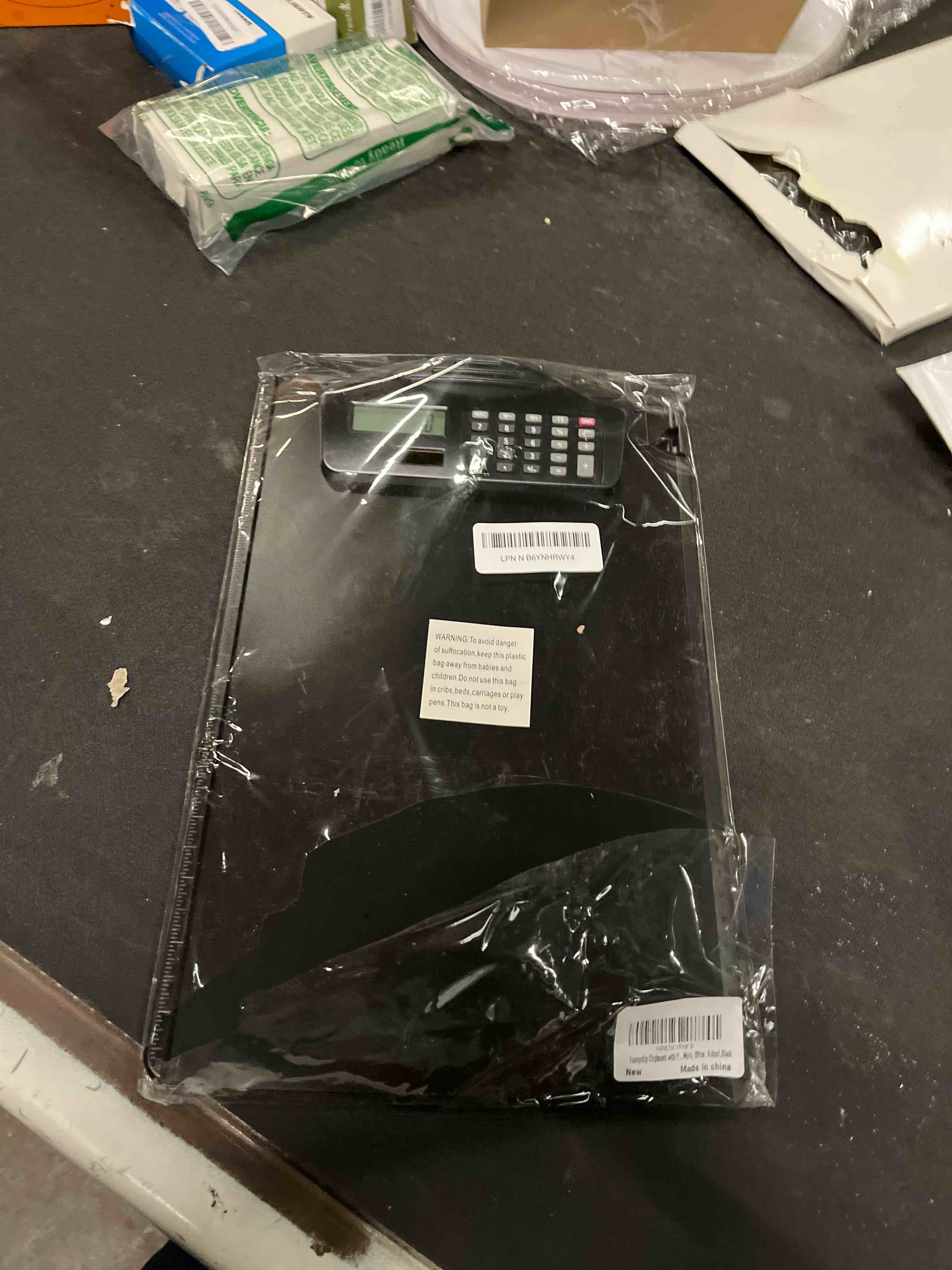 Condition photo showing Good Condition for sunnyclip clipboard with pen holder & calculator, [20% thicker & durable] plastic clip board with side ruler, 9x13 hanging contractor clipboard for letter size/a4 paper, for work, office, school,black