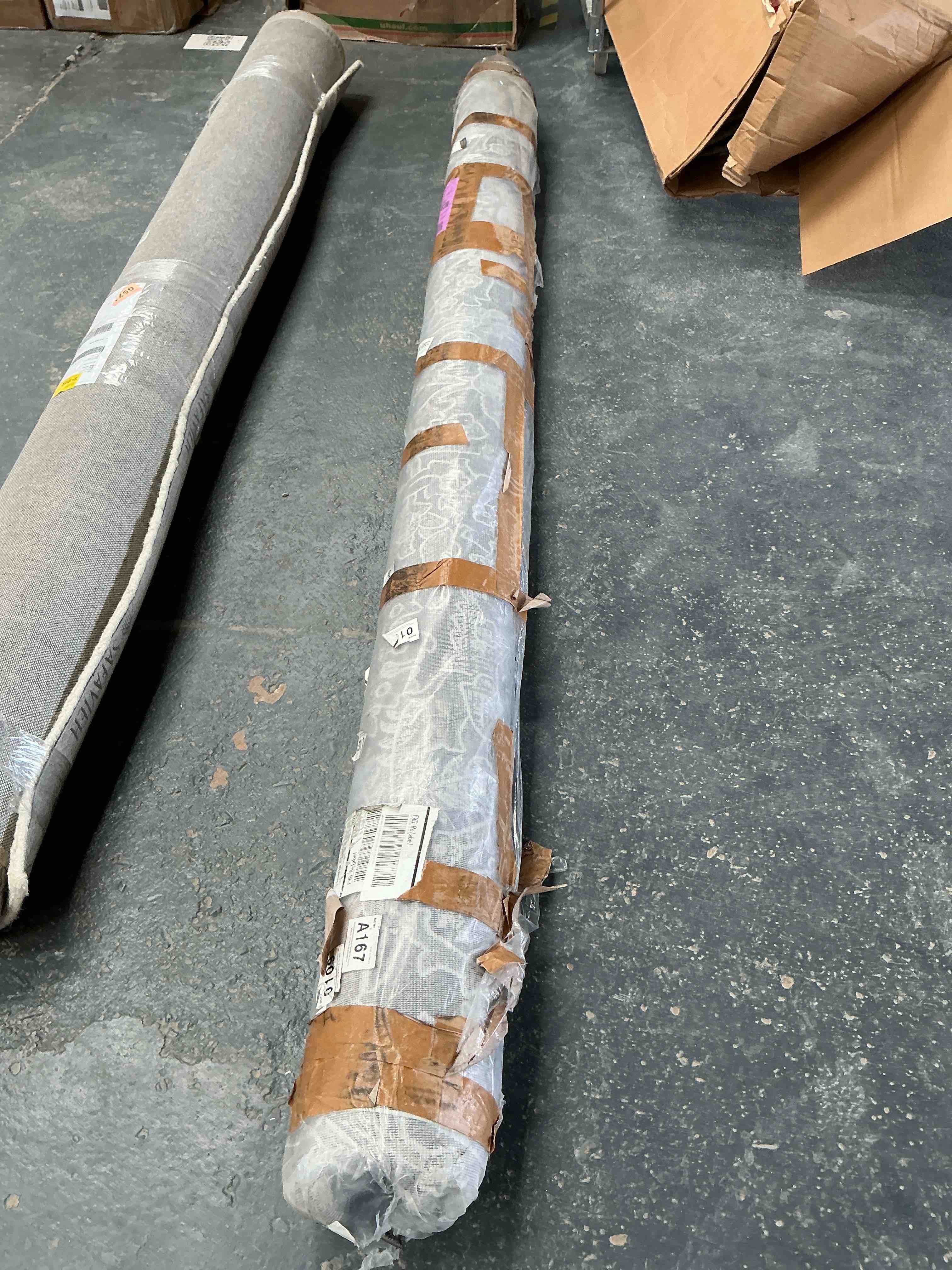 Condition photo showing Good Condition for Surya Indigo IGO-2317 94x122  Rectangle Plastic Rug in Beige/Charcoal