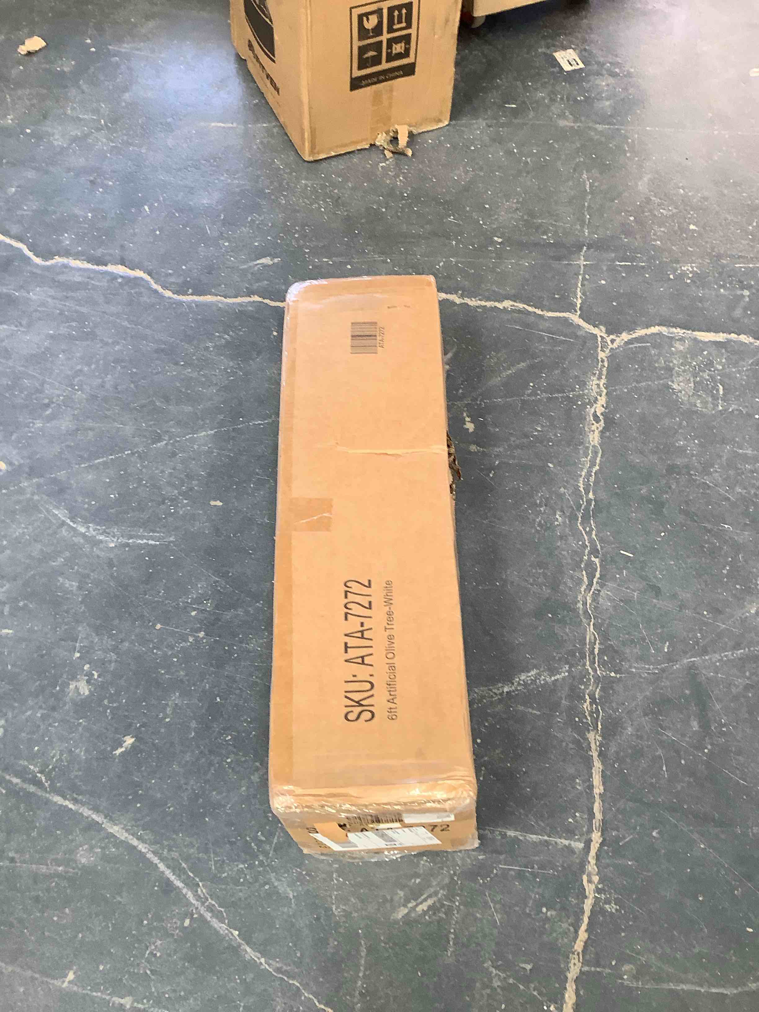 Condition photo showing Good Condition for 6 feet artificial olive tree, white color