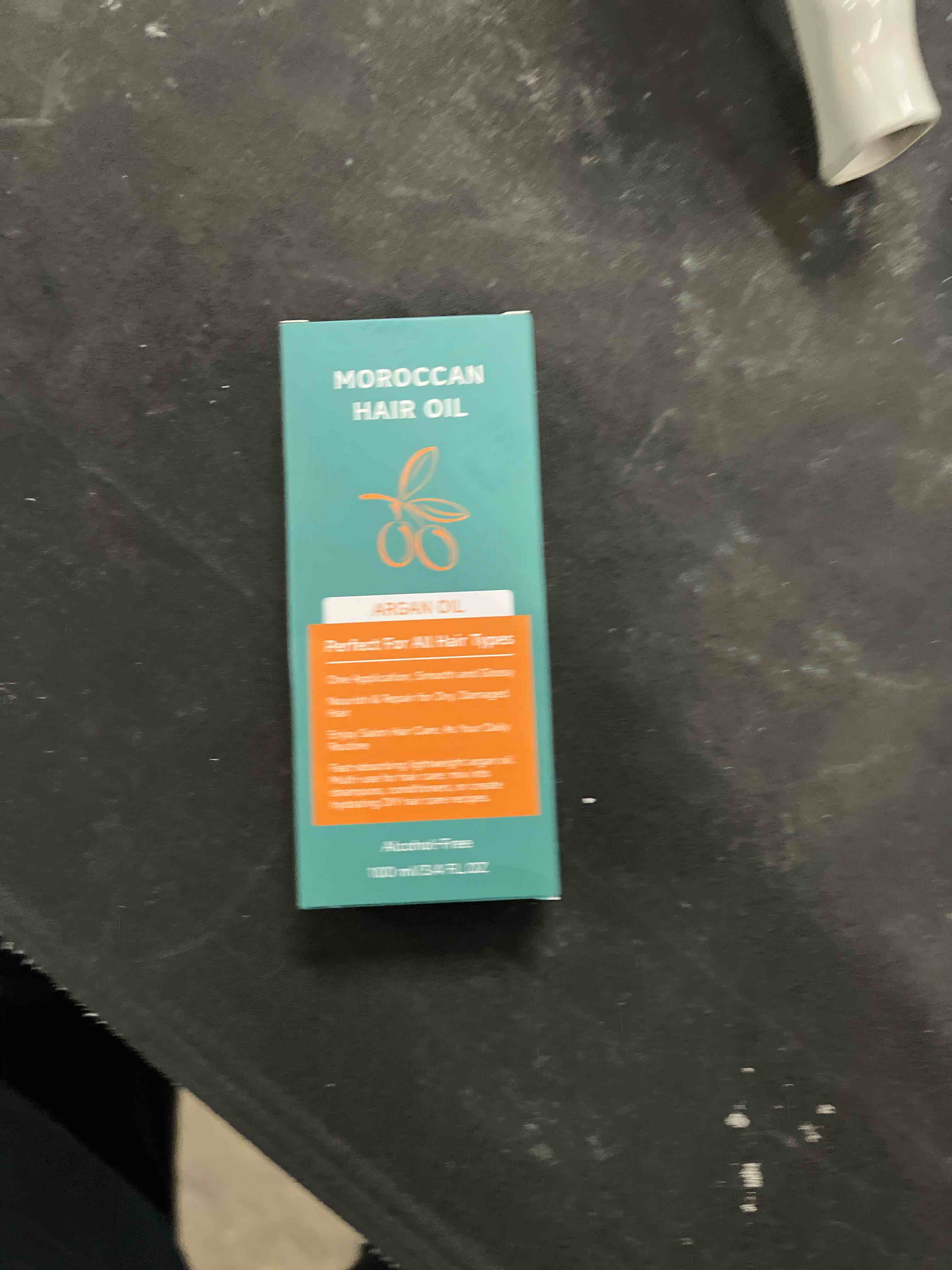 Condition photo showing Good Condition for Outccogo Moroccan Argan Oil, Hair Oil for Frizzy Hair, Nourishing Smooths Moroccan Hair Oil for Frizz Control Curly Long Dry Damaged Curly Hair Treatment and Heat Protectant, 3.4 Fl Oz