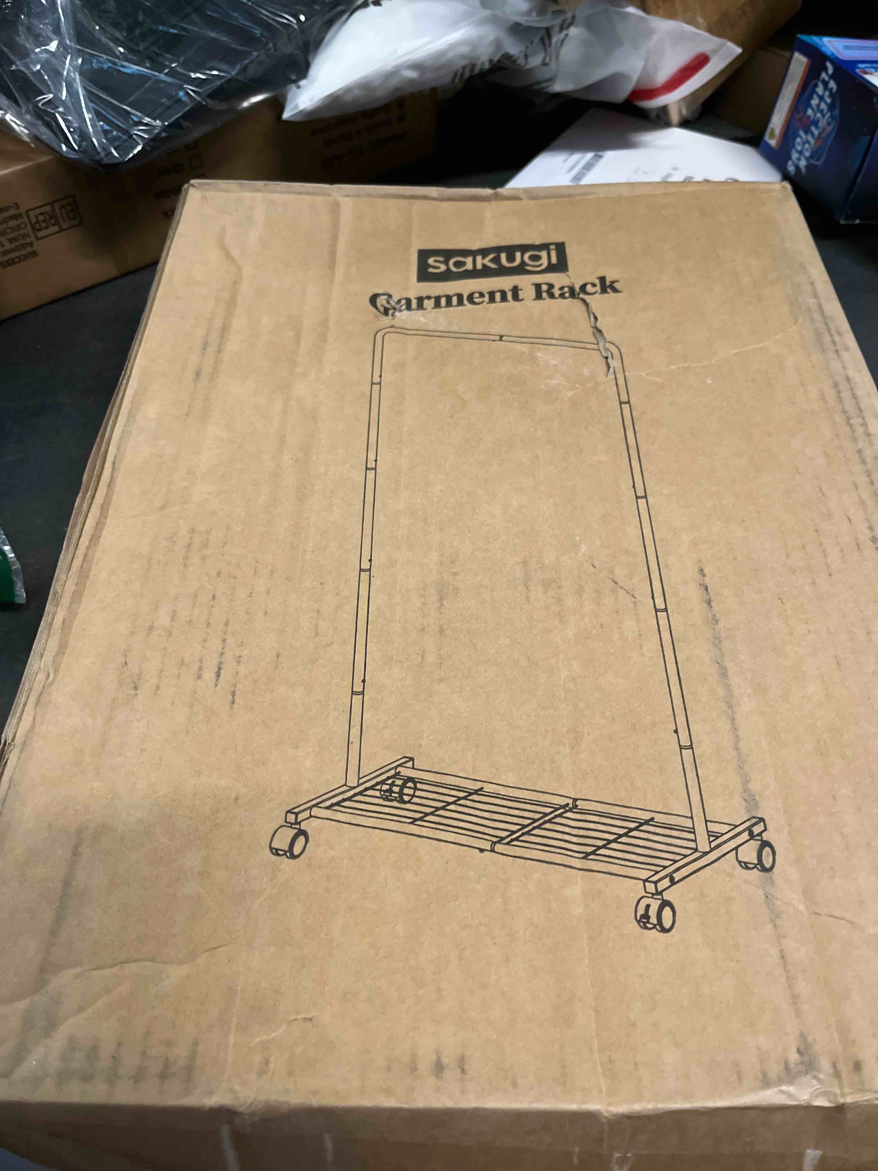 Condition photo showing Good Condition for Clothes Rack - Clothing Rack with Storage Mesh Shelf & Casters, Heavy-Duty Metal Clothing Rack for Hanging Clothes, Dresses, Coats, Large Load Capacity, Easy Assembly, White, 28.0"x16.9"x59.0" White 28.0" x 16.9" x 59.0" (1 Rod)