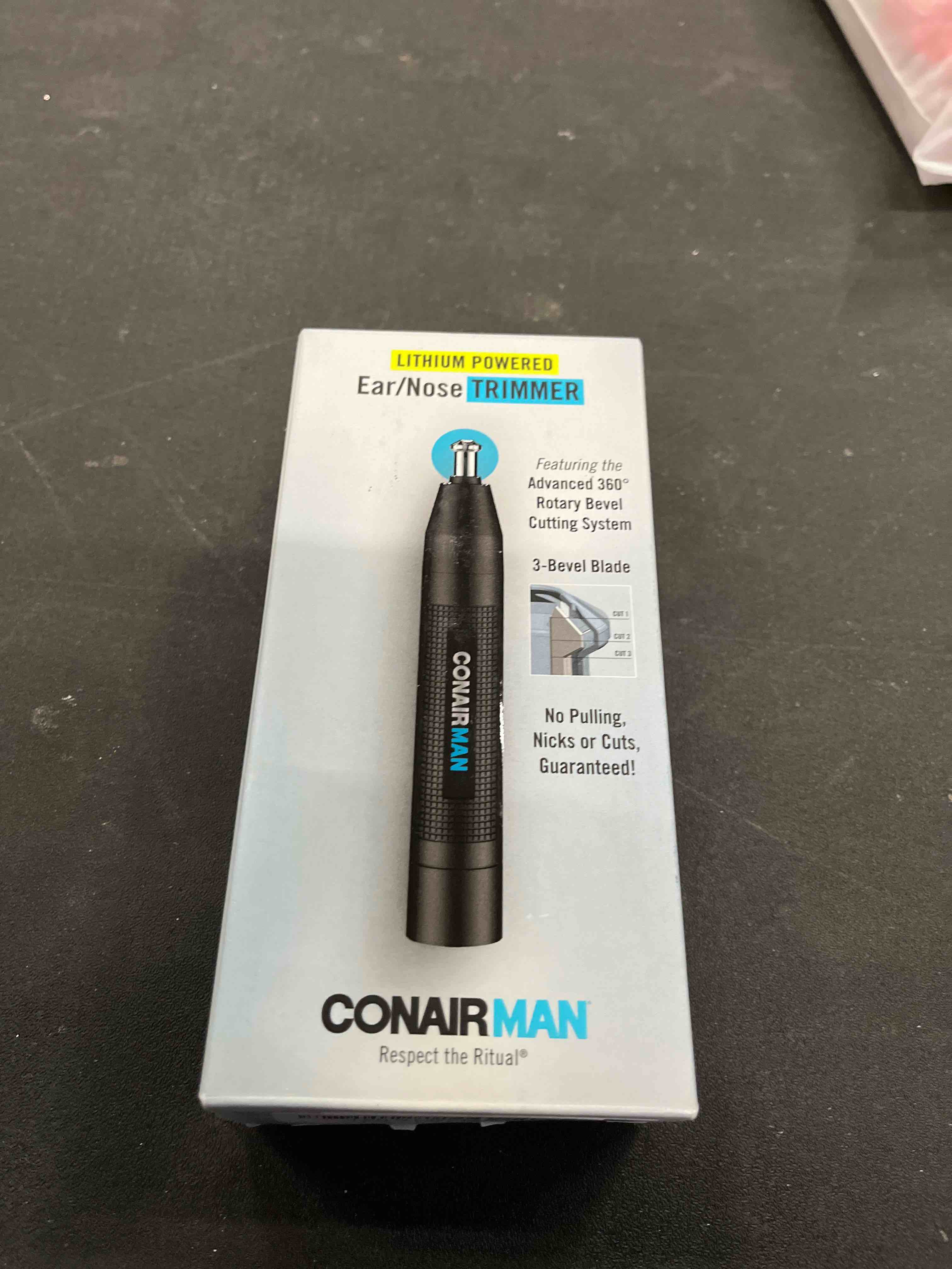 Condition photo showing Good Condition for ConairMan Nose Hair Trimmer for Men, For Nose, Ear, and Eyebrows, Patent 360 Bevel Blade for No Pull, No Snag Trimming Experience, Cordless Lithium-Powered Trimmer with Drawstring Bag Men's: Lithium Powered 1 Count (Pack of 1)