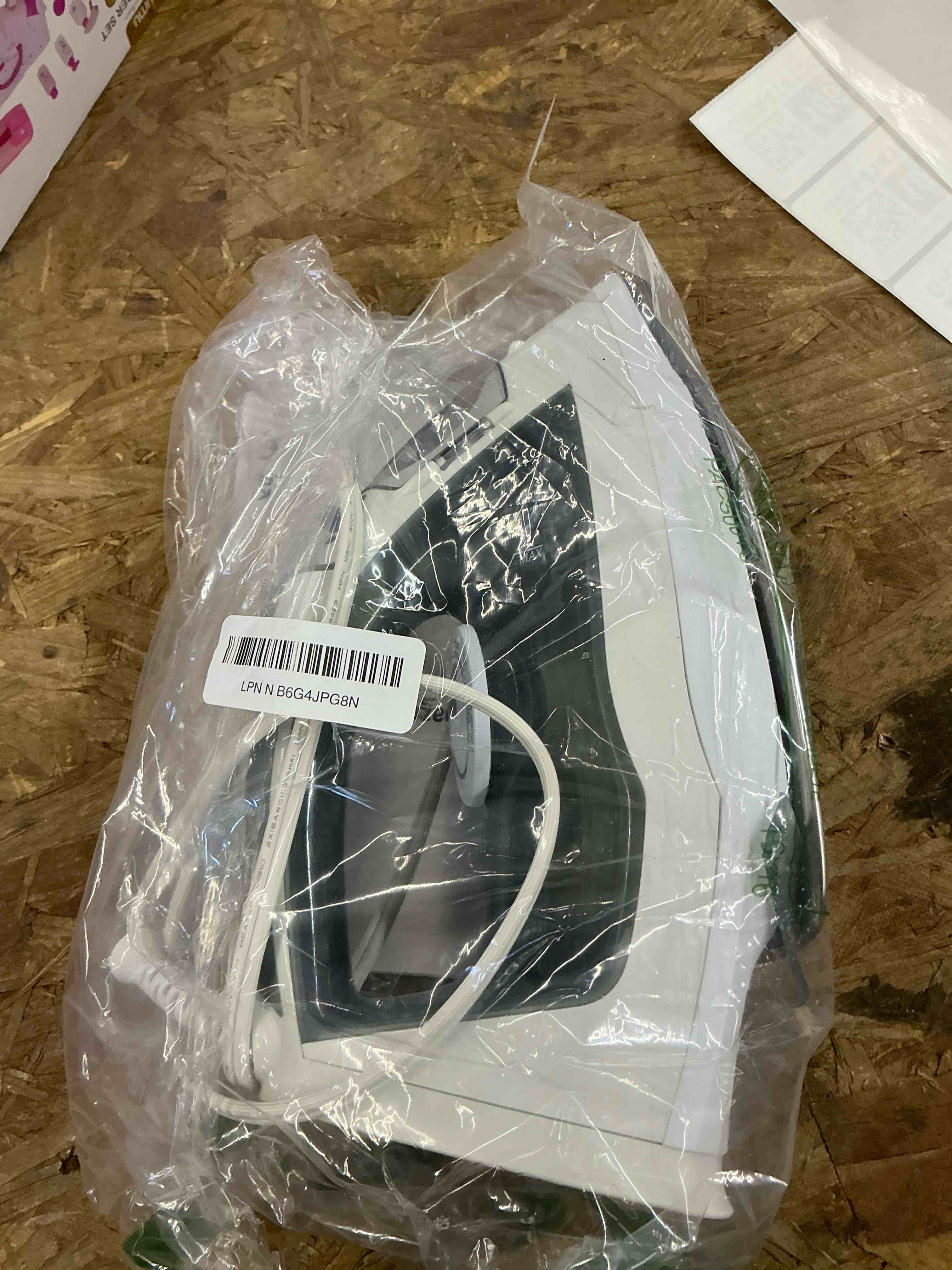 Condition photo showing Good Condition for Amazon Basics Steam Iron for Clothes with Safety Auto Shut-Off, Handheld Steamer, Steel Soleplate, 1700-Watt, 1.62ft, Gray 1.62ft Stainless Steel Soleplate, 1700W