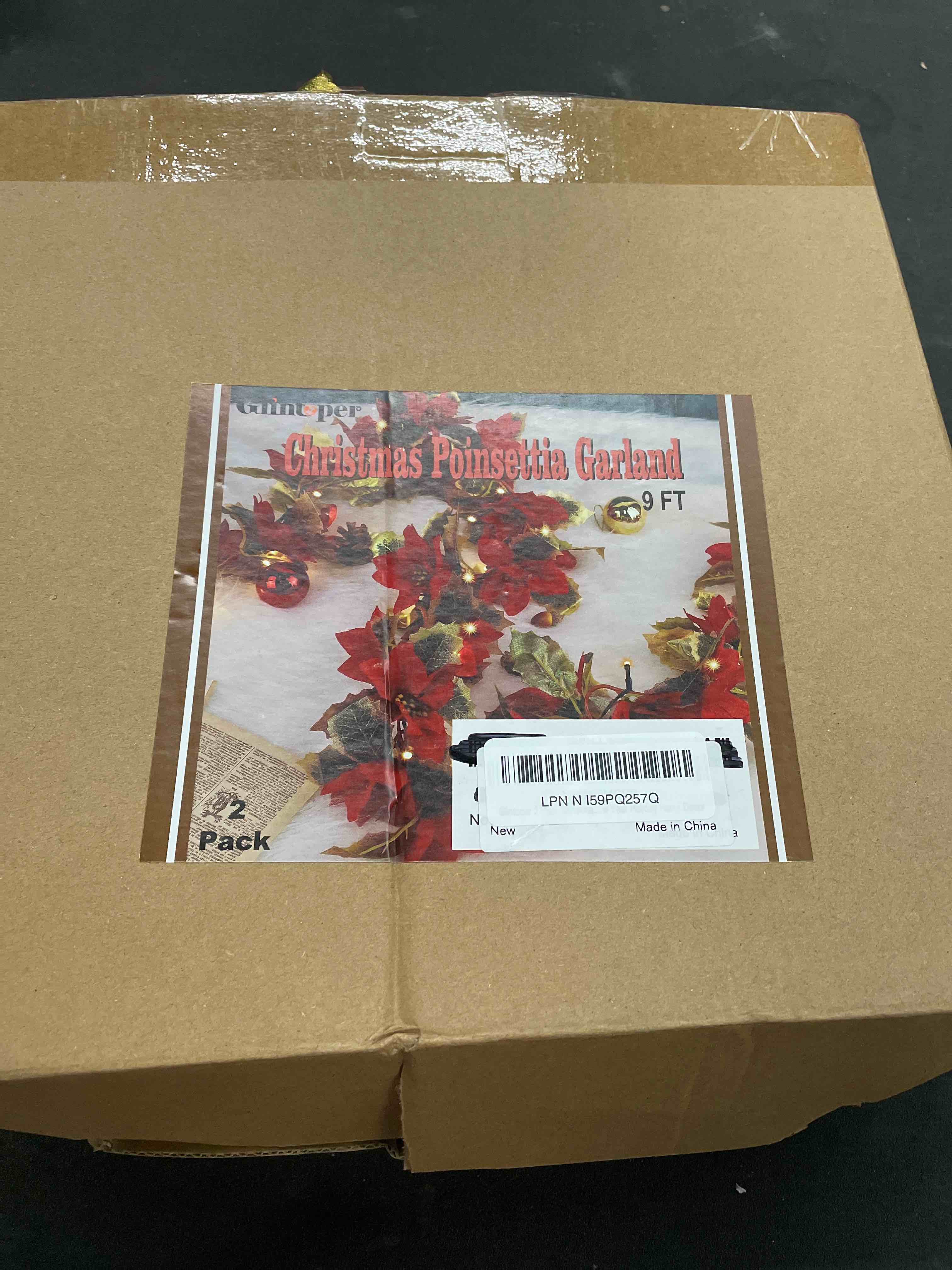 Condition photo showing Good Condition for Glintoper 2 Pack Christmas Poinsettia Garland, 5.9 FT Lighted Artificial Garlands with 36 Red Flowers, Battery Operated with Timer Poinsettia String Lights, Light up for Xmas New Year Home Decor 2 5.9 FT