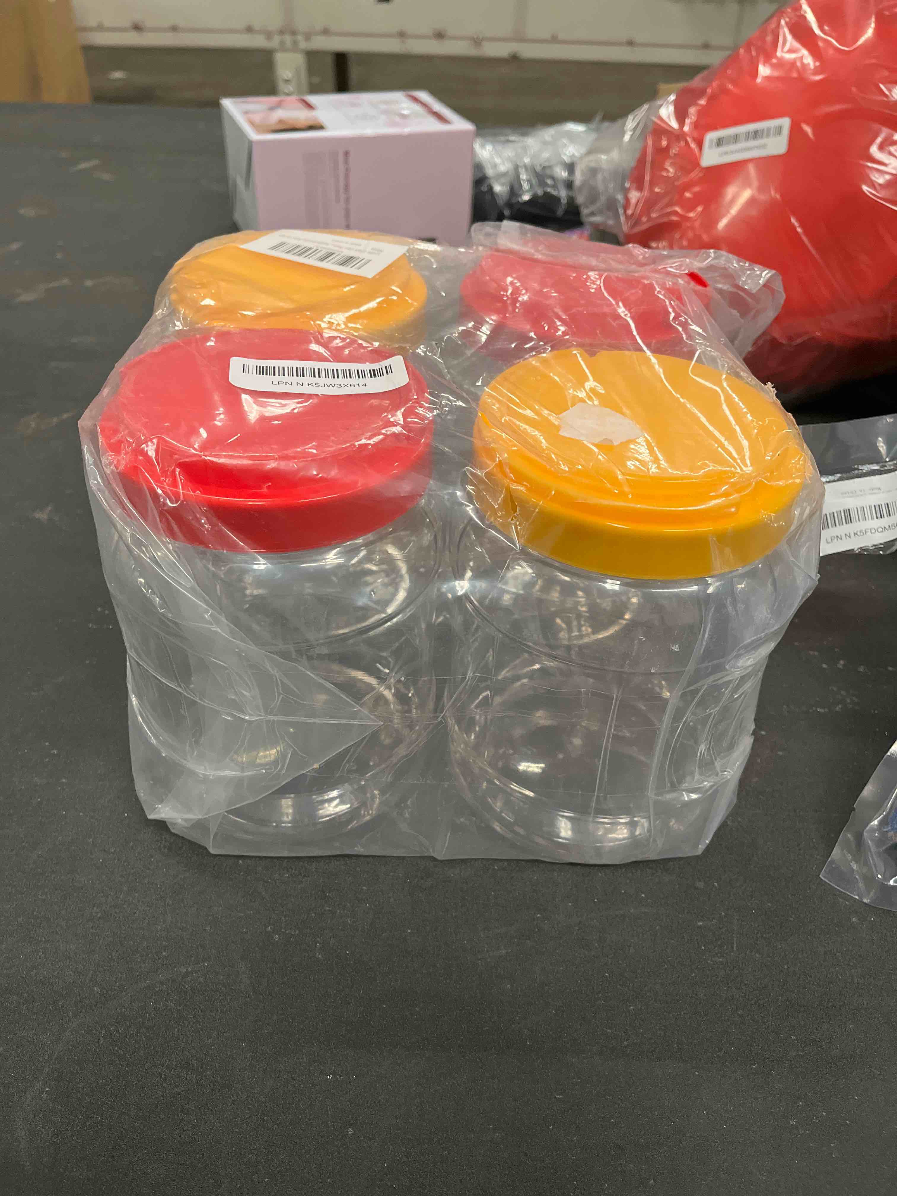 Condition photo showing Good Condition for Lyellfe 4 Pack Clear Plastic Jars, Half Gallon Wide Mouth Storage Containers with Leak-proof Lids Handle, BPA Free Empty Plastic Jar for Flour, Dry Goods, Cookies, Candy, Airtight Food Storage