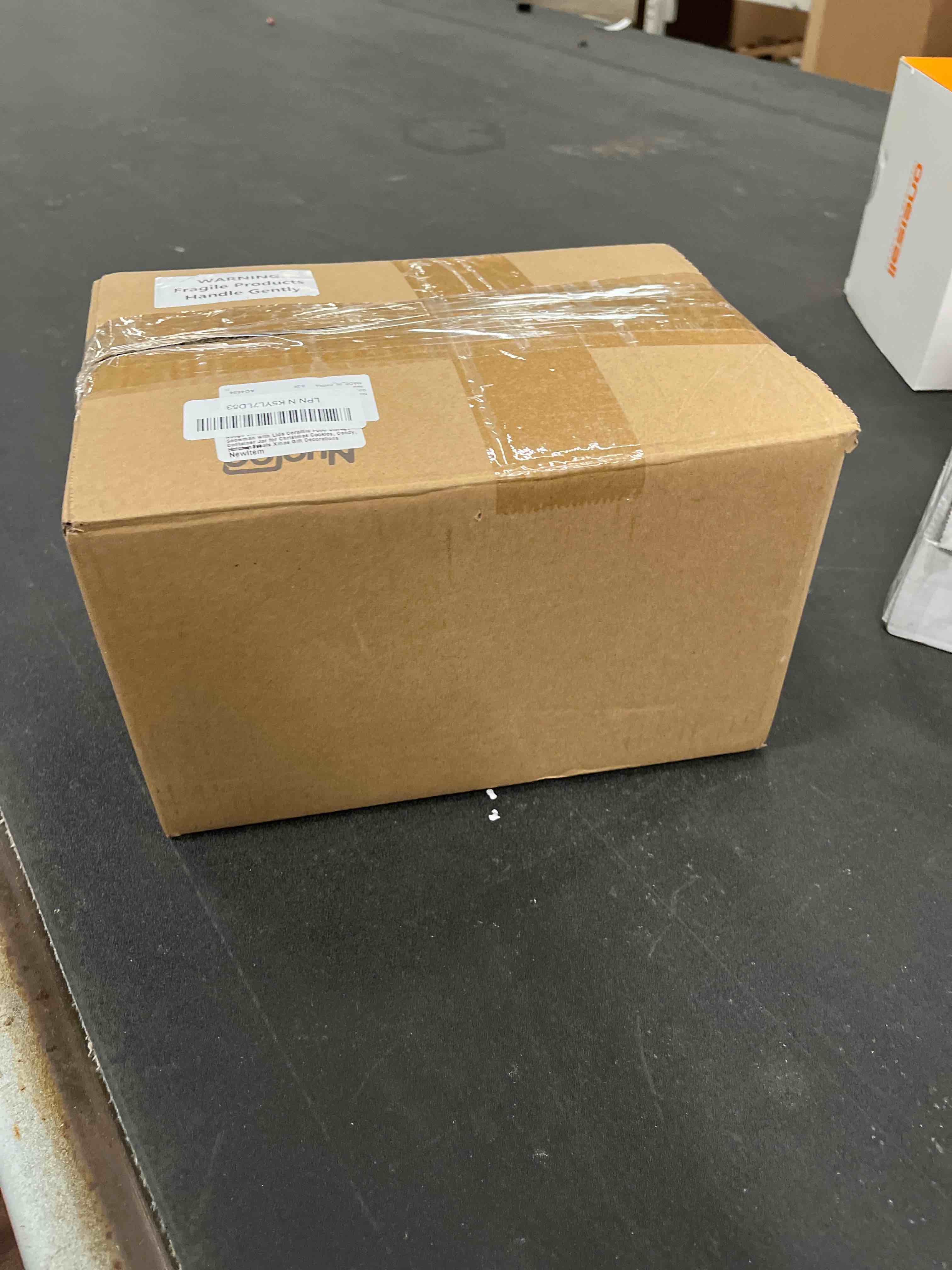 Condition photo showing Good Condition for Nuogo Christmas Cookie Jar Ceramic Santa Snowman with Lids Ceramic Food Storage Container Jar for Christmas Cookies, Candy, Holiday Treats Xmas Gift Decorations (Chic Santa)