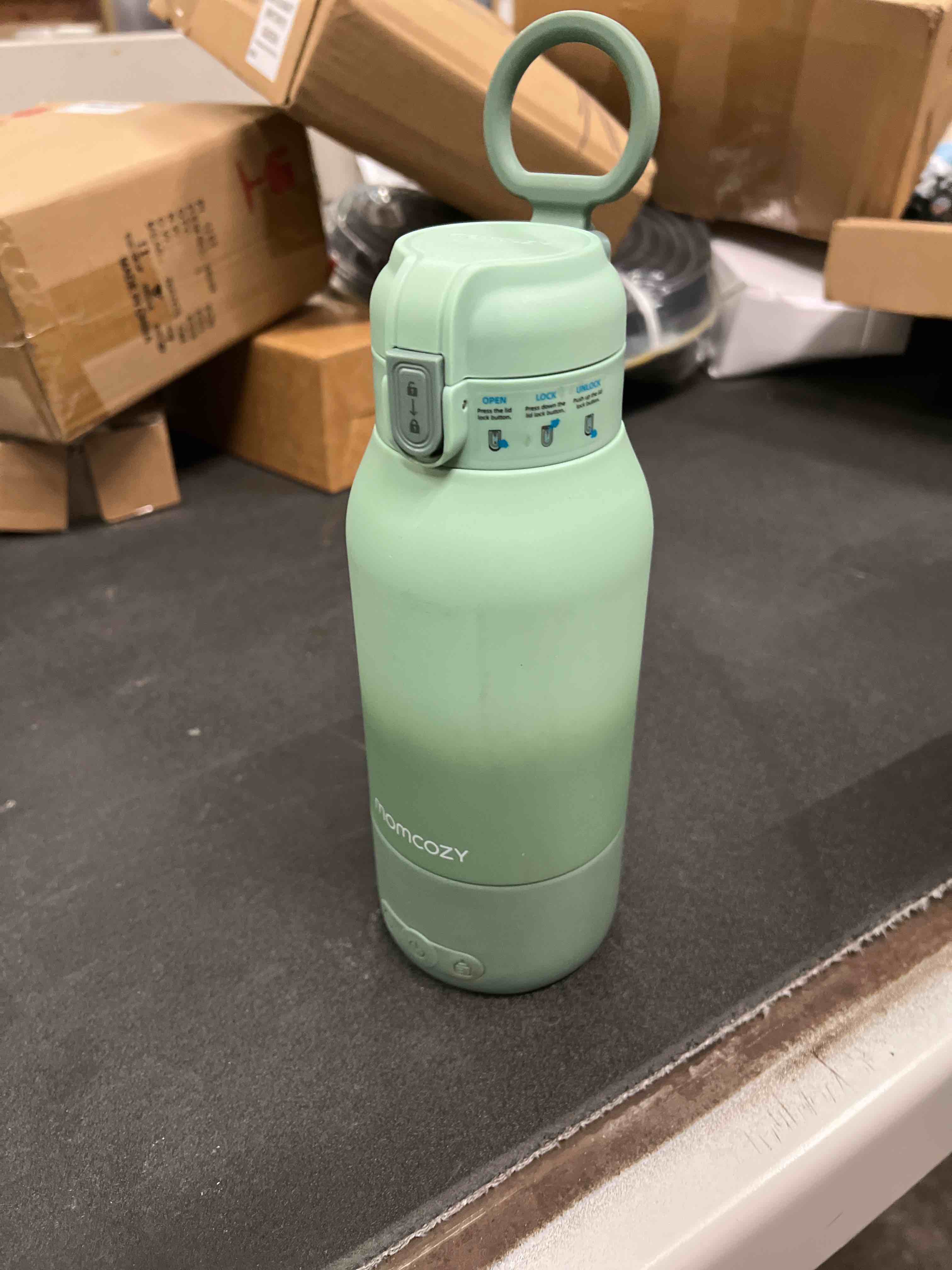 Condition photo showing Good Condition for Momcozy Portable Milk Warmer for Travel – Dual Heating Modes for Breast Milk & Water, Portable Bottle Warmer with Fast Heating & Long Battery Life, 17 Ounces Large Capacity to Meet Your All-Day Needs Green