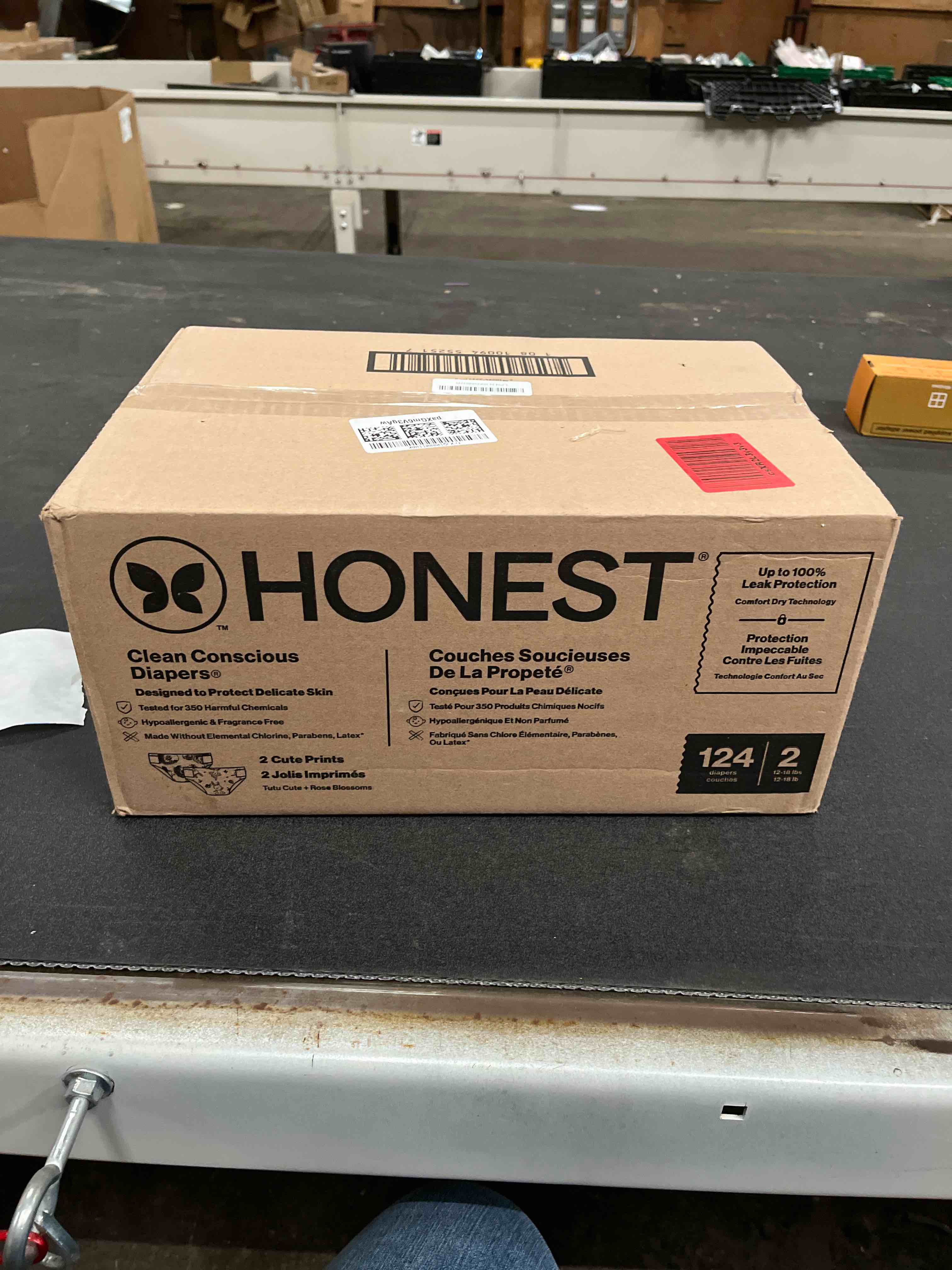Condition photo showing Good Condition for The Honest Company Clean Conscious Diapers for Delicate Skin | Up to 100% Leakproof | Hypoallergenic, Fragrance Free | Girl Prints | Super Club Box, Size 2 (12-18 lbs), 124 Count (Prints May Vary) Size 2 (124 Count) Rose Blossom + Tutu Cute
