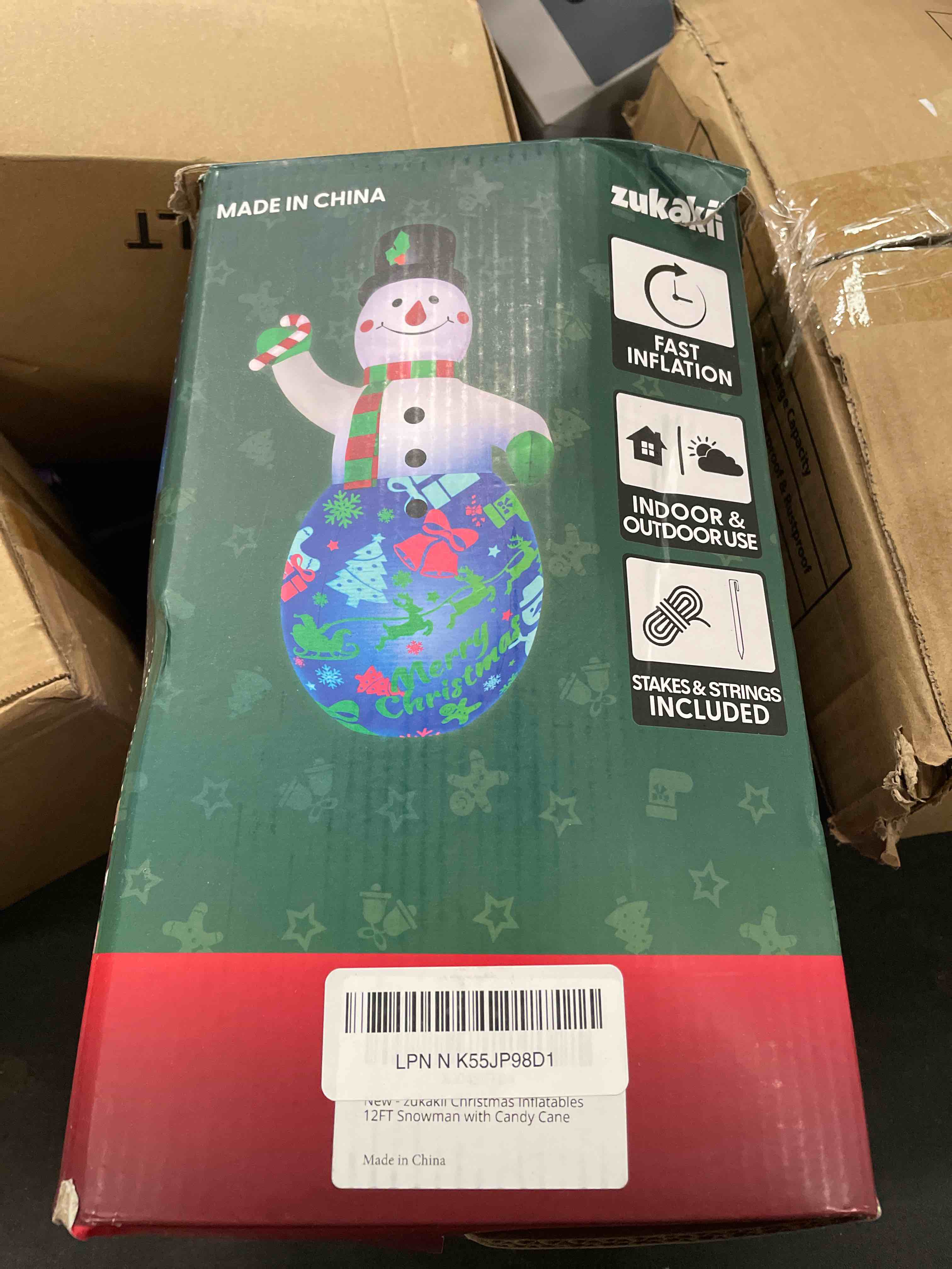 Condition photo showing Good Condition for 12FT Giant Christmas Inflatables Decorations Snowman Built-in Music & 360° Rotation 3-Color LED Lights, Huge Christmas Blow Up Yard Decoration Outdoor for Xmas Garden New Year 12FT Music Snowman with Candy Cane