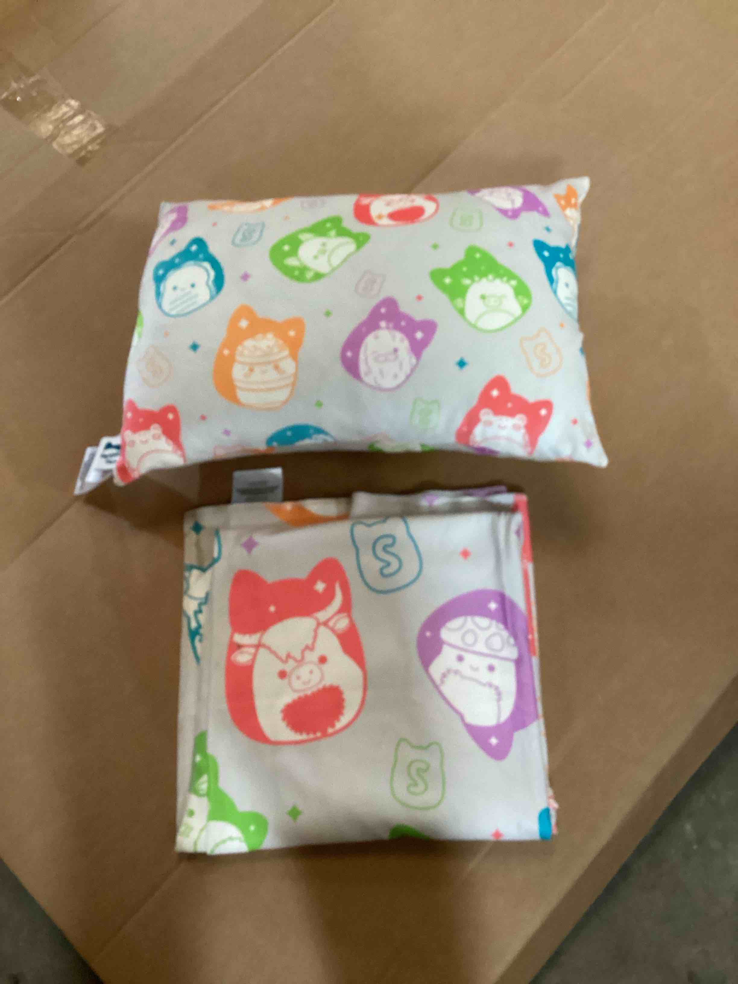 Condition photo showing New/Like New for squish pillow with polyester blanket