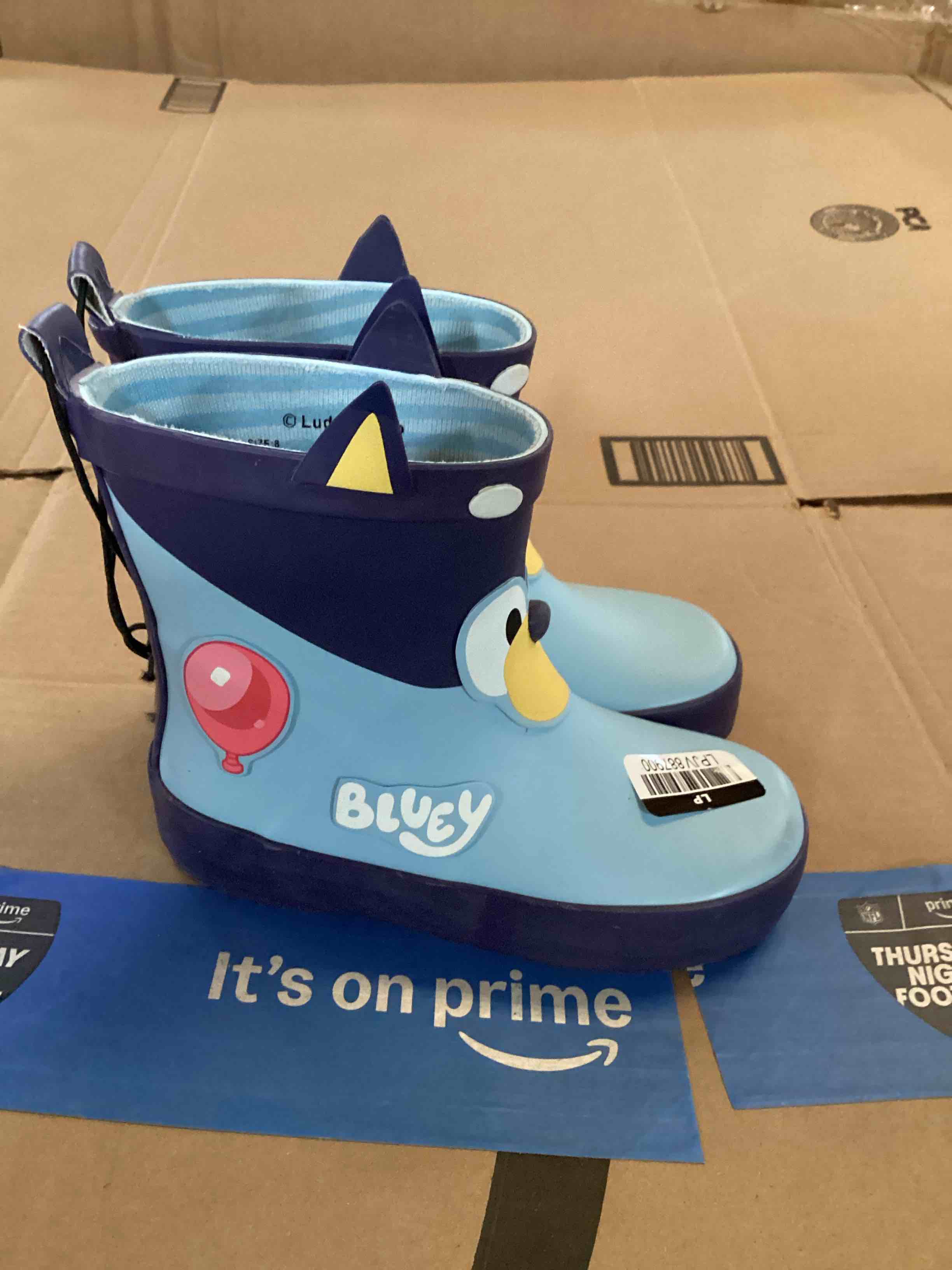 Condition photo showing New/Like New for bluey themed rainboots