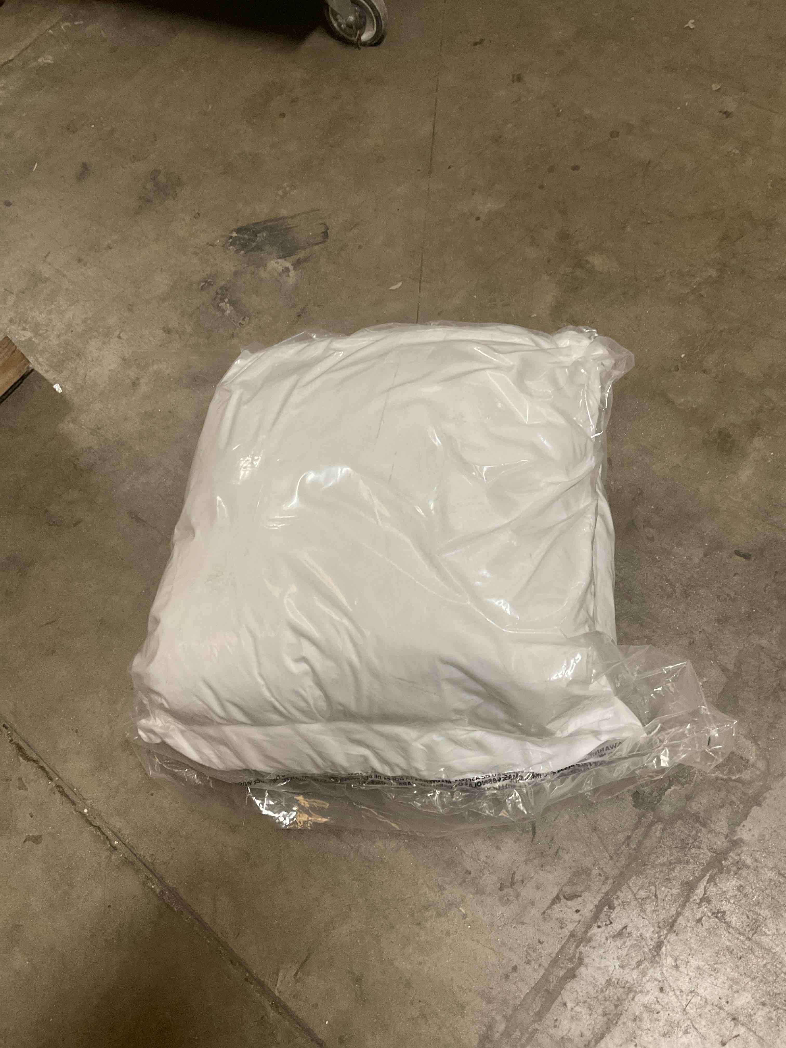 Condition photo showing Good Condition for large fluffy white pillow