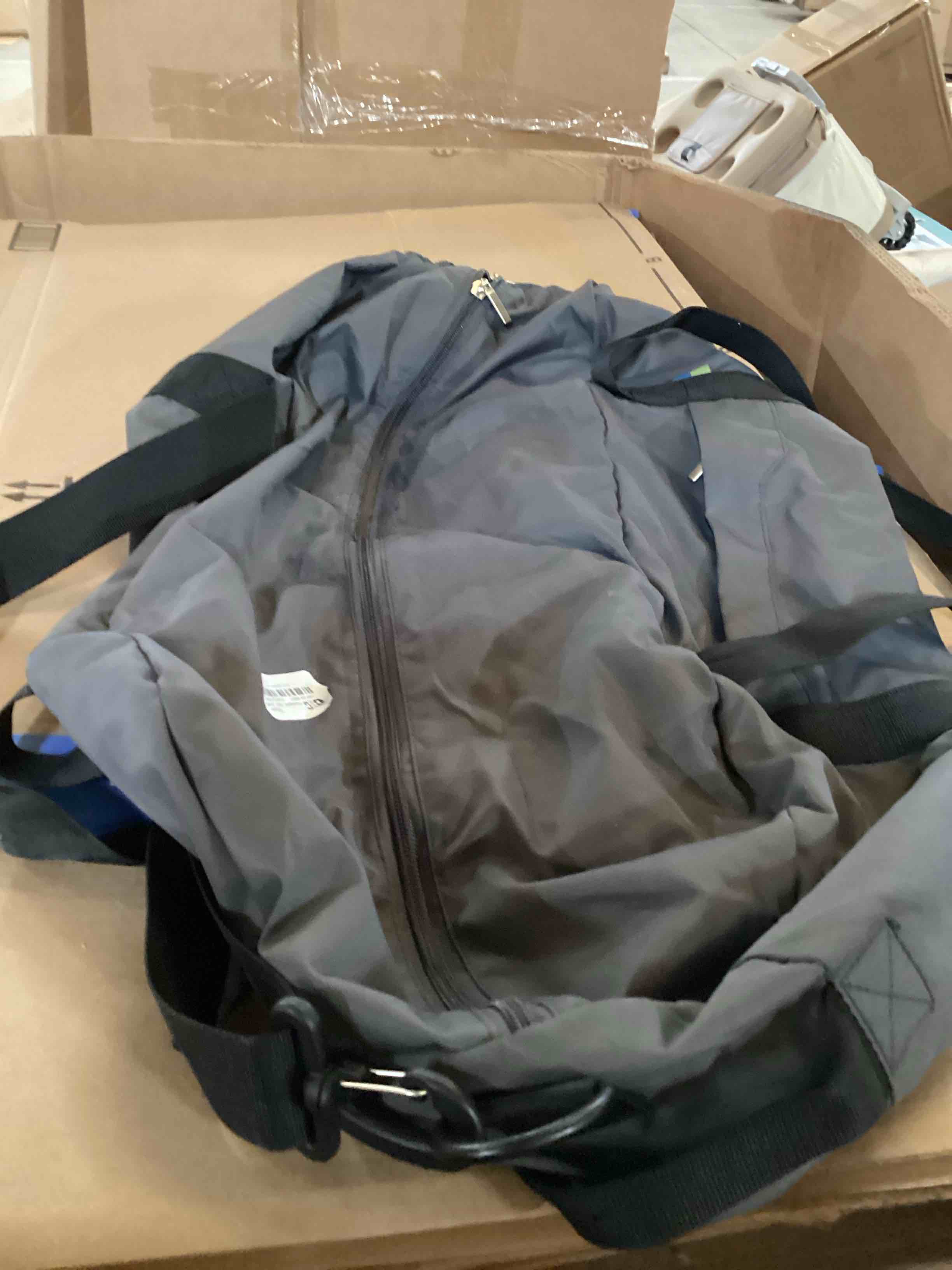Condition photo showing New/Like New for duffle bag