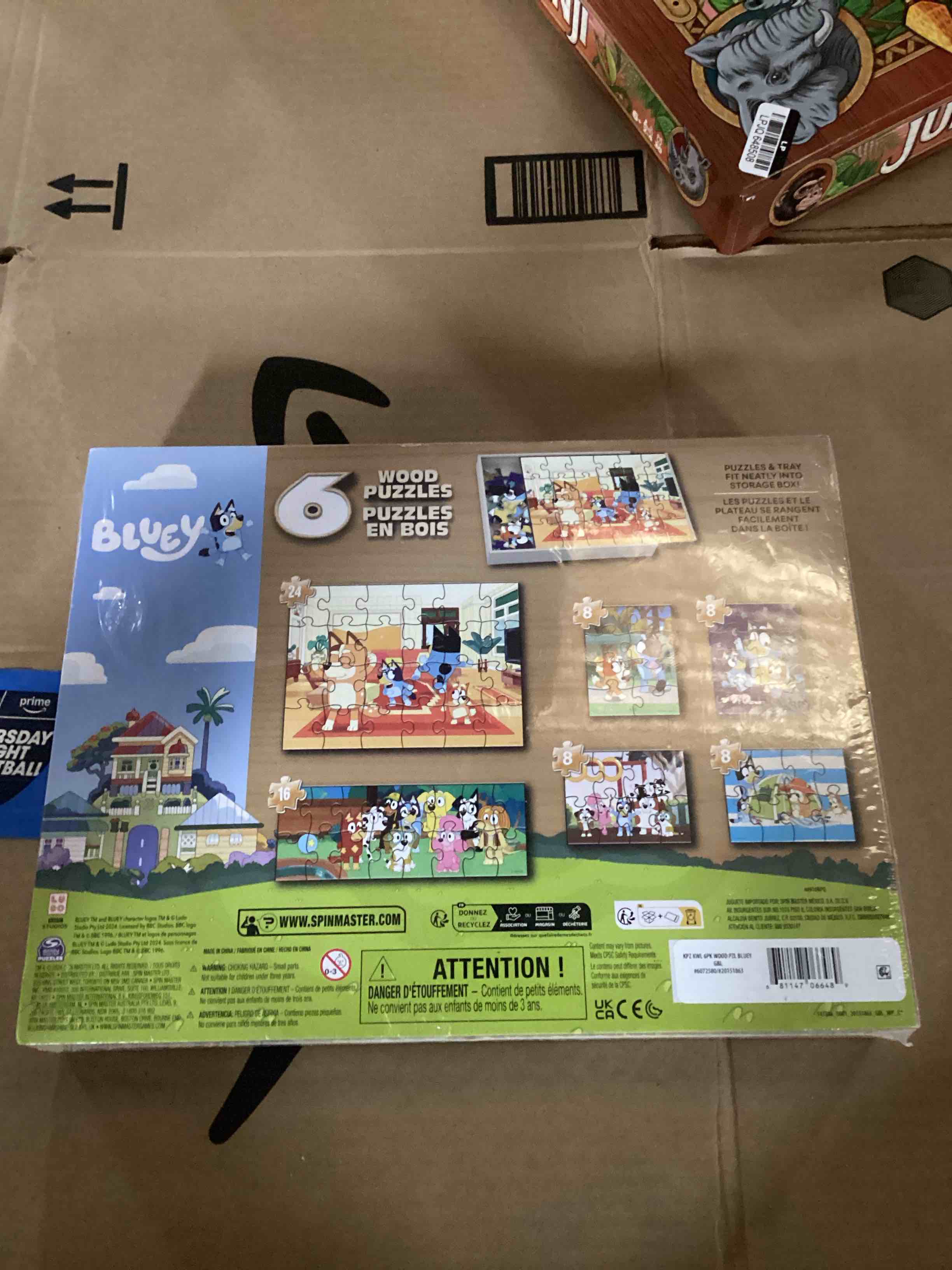 Condition photo showing New/Like New for bluey themed puzzles