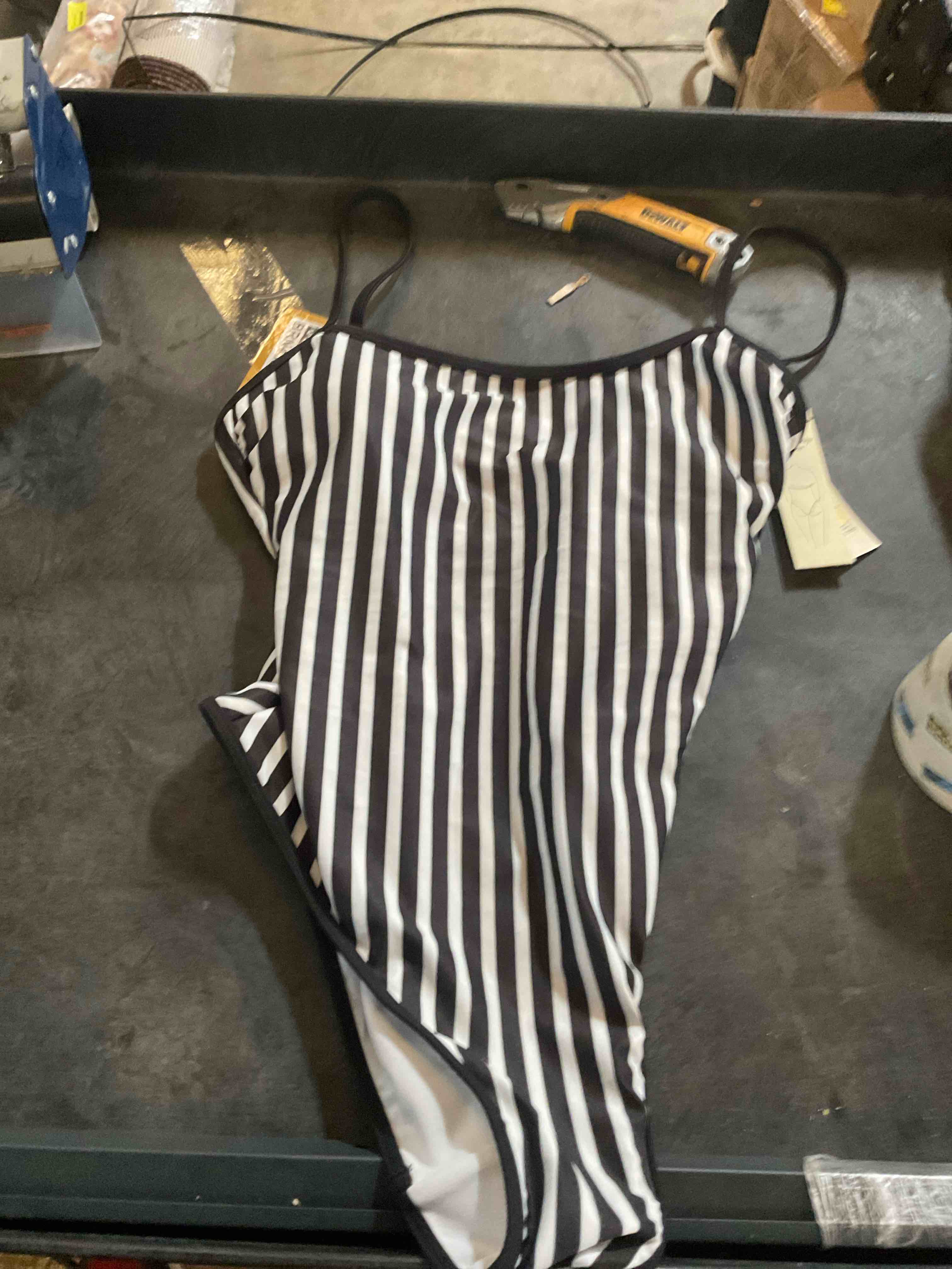 Condition photo showing Good Condition for no boundaries black white striped swimsuit size m