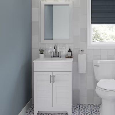 24 in vanity with white cultured marble top (piece broken)
