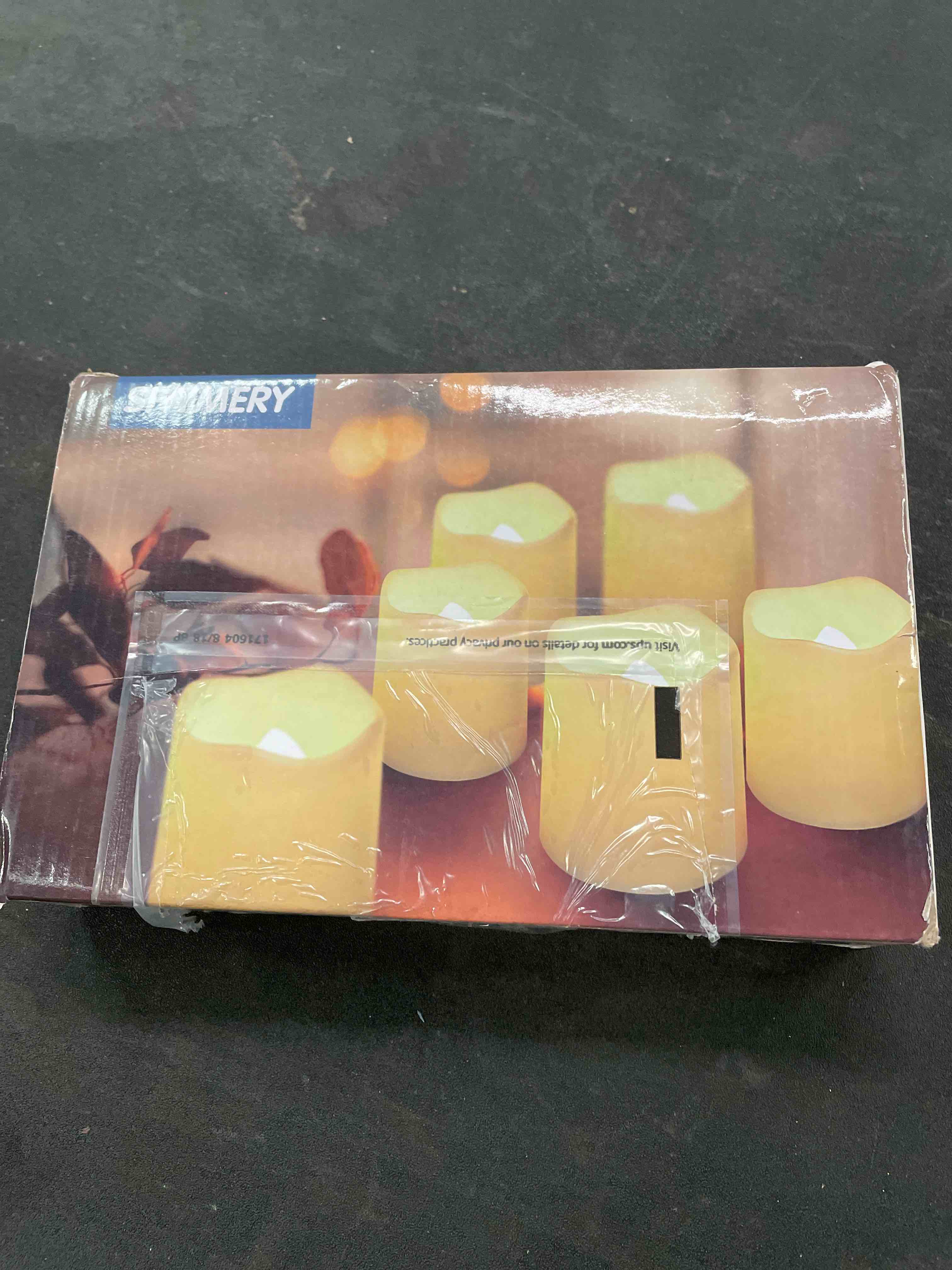 Condition photo showing Good Condition for SHYMERY Flameless Votive Candles,Flameless Flickering Electric Fake Candle,24 Pack 200+Hour Battery Operated LED Tea Lights in Warm White for Wedding, Table, Halloween,Christmas Decorations 1.5"X1.7" Warm White Pack of 24