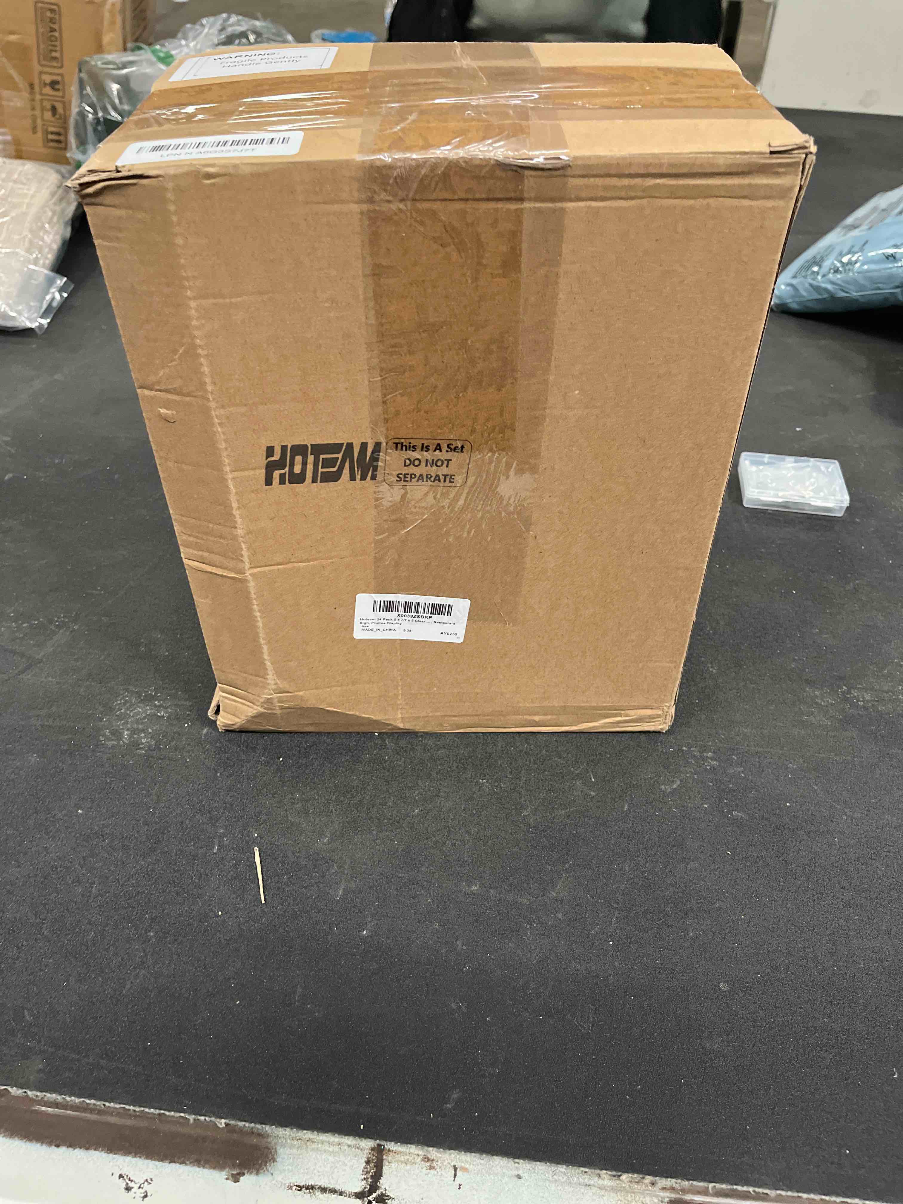 Condition photo showing Good Condition for Hoteam 24 Pack 5 x 7/7 x 5 Clear Acrylic Sign Holder with Gold Border, Gold Picture Frame, Double Sided Wedding Table Number, Acrylic Menu Stands for Wedding Table, Restaurant Sign, Photos Display 24 5 x 7 Inch/7 x 5 Inch