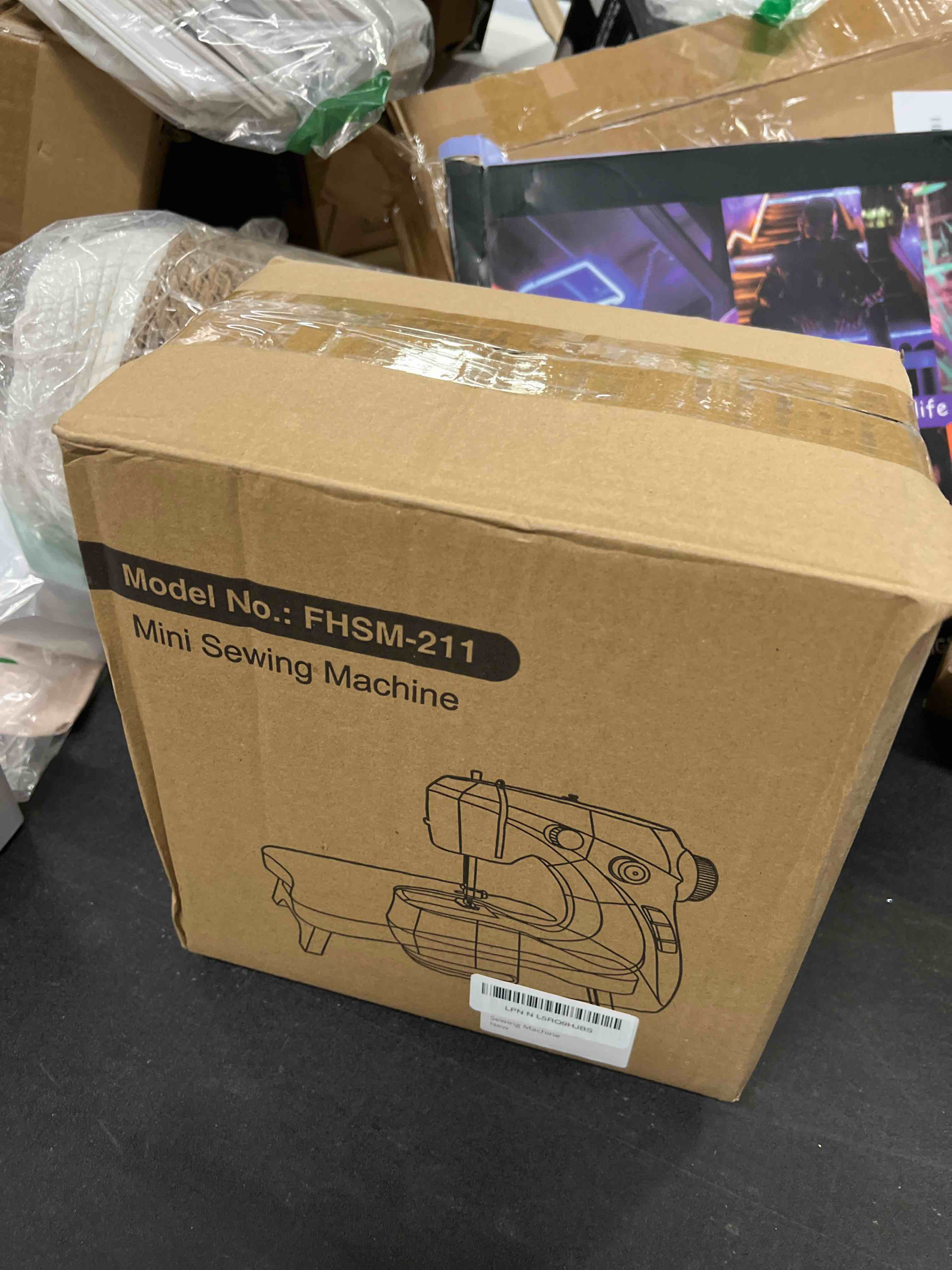 Condition photo showing Good Condition for Mini Sewing Machine, Portable with Extension Table & Sewing Kit, Dual Speed Control, Built-in Light, Ideal for Beginners & Quick Household Repairs Blue