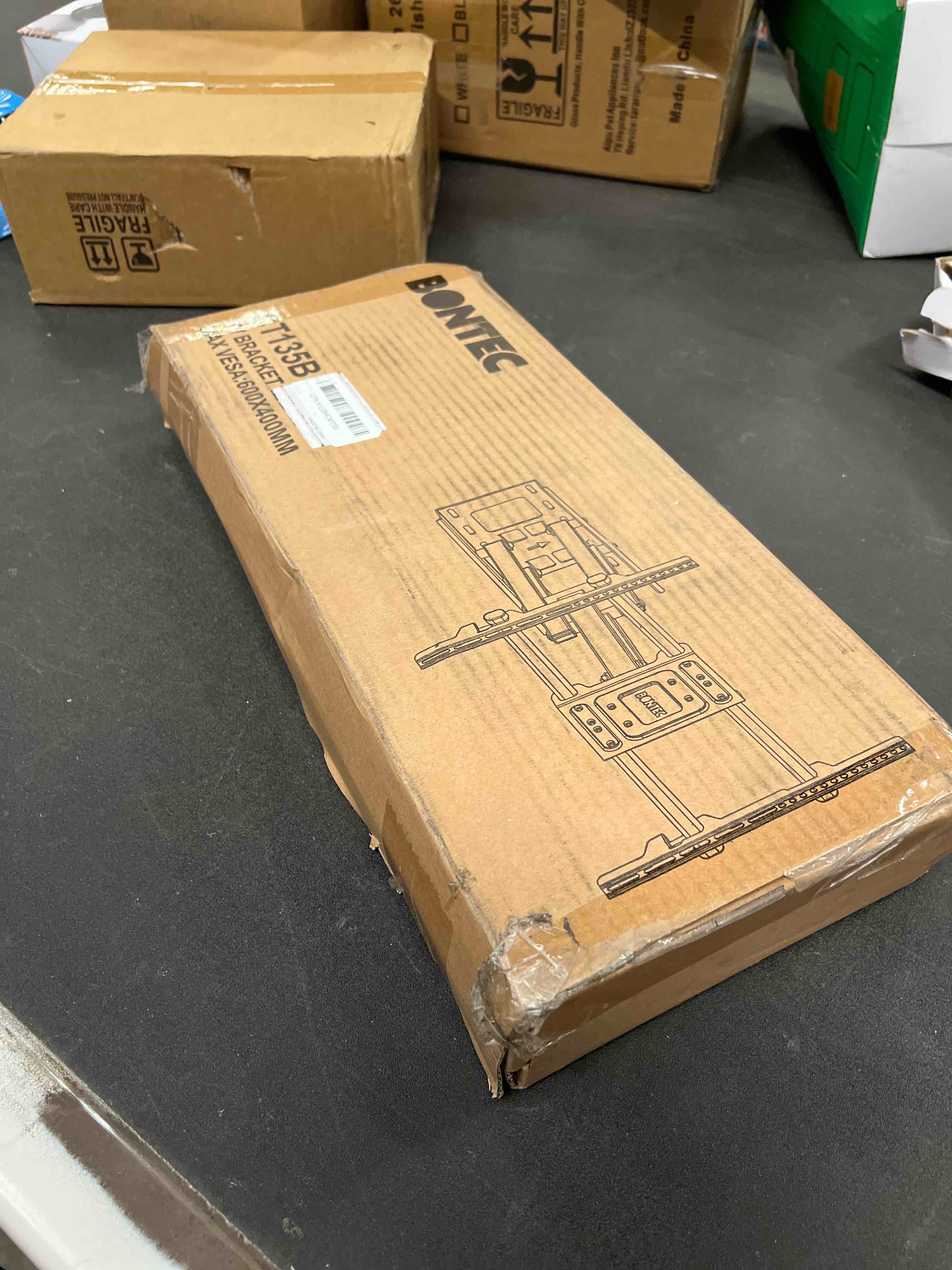 Condition photo showing Good Condition for BONTEC Full Motion TV Wall Mount for 37-84 Inch TVs, Hold up to 132lbs, Max VESA 600x400mm, Swivel Tilt Dual Arms, Adjustable Viewing Angle, Fits 16" Wood Studs, Easy Assembly