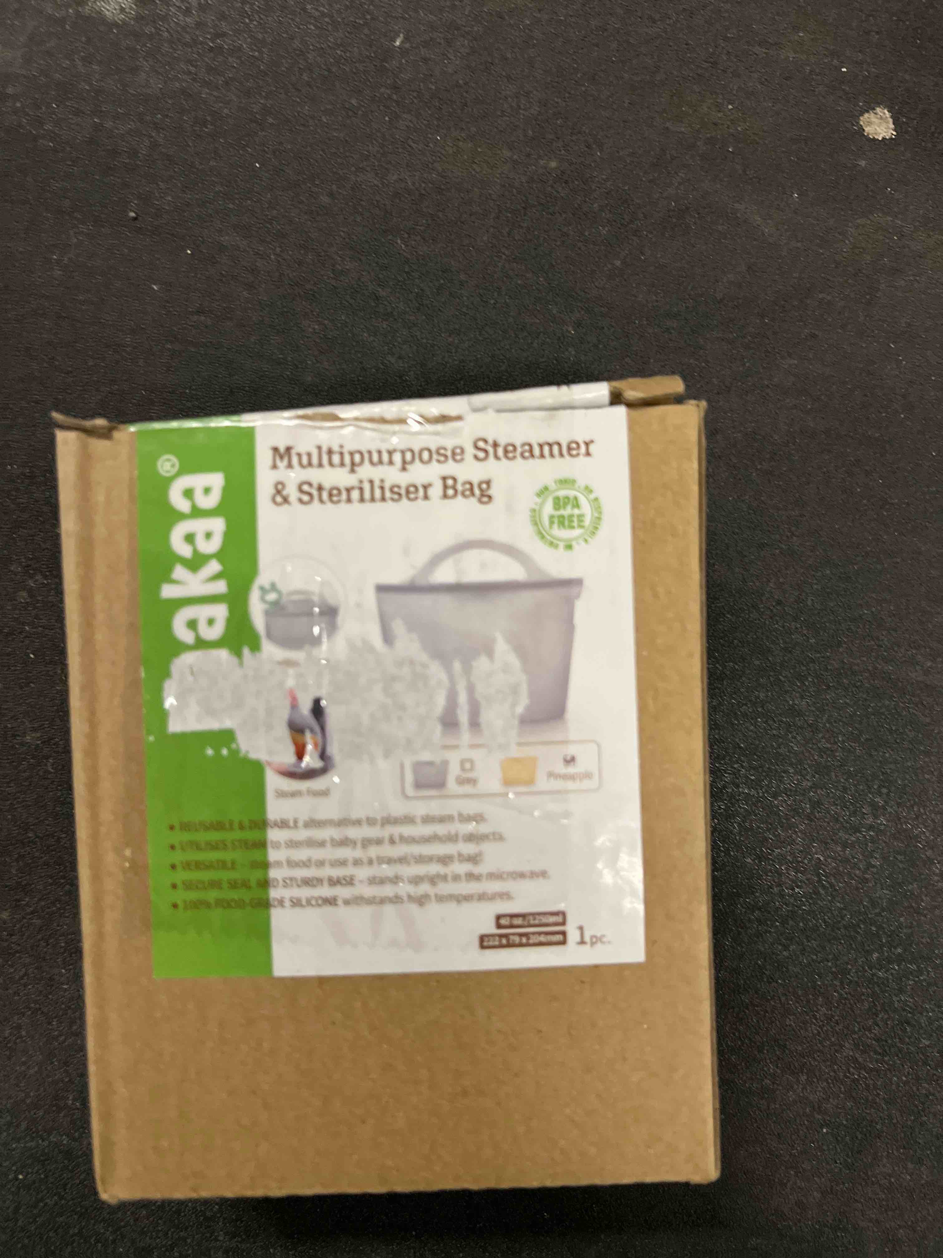 Condition photo showing Good Condition for Haakaa On-The-Go Silicone Microwave Steam Sterilizer Bags for Travel, 40oz/1250ml Reusable Silicone Steaming Bags for Baby Bottles, Breast Pump, Accessories, Pacifiers, Teethers, Pineapple/1PC 1250ML Pineapple 1PC