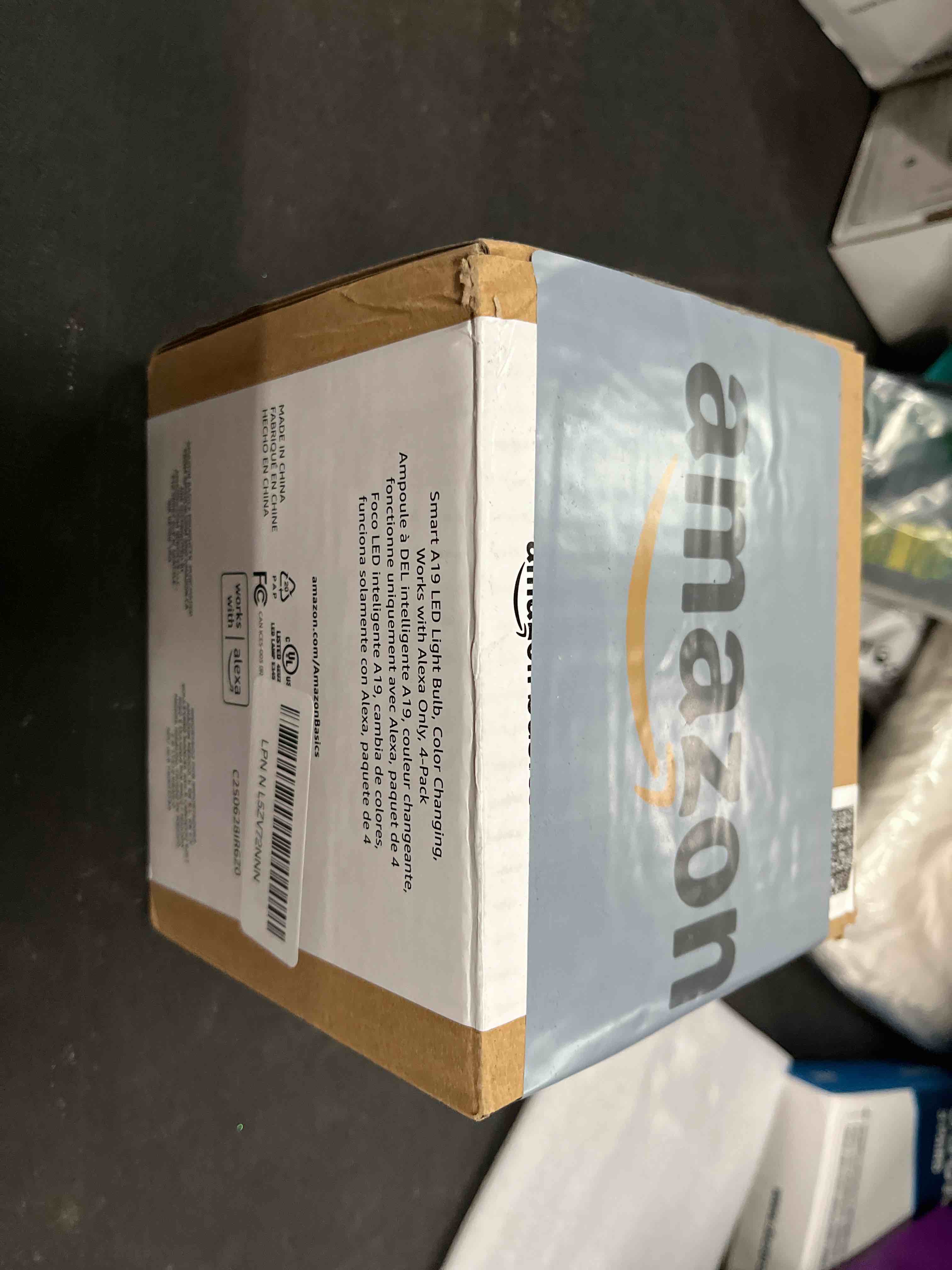 Condition photo showing Good Condition for Amazon Basics Smart A19 LED Light Bulb, Color Changing, 9W (60W Equivalent), 800LM, Works with Alexa Only, 2.4 GHz Wi-Fi, No Hub Required, 4 Pack Color Changing 4 Pack