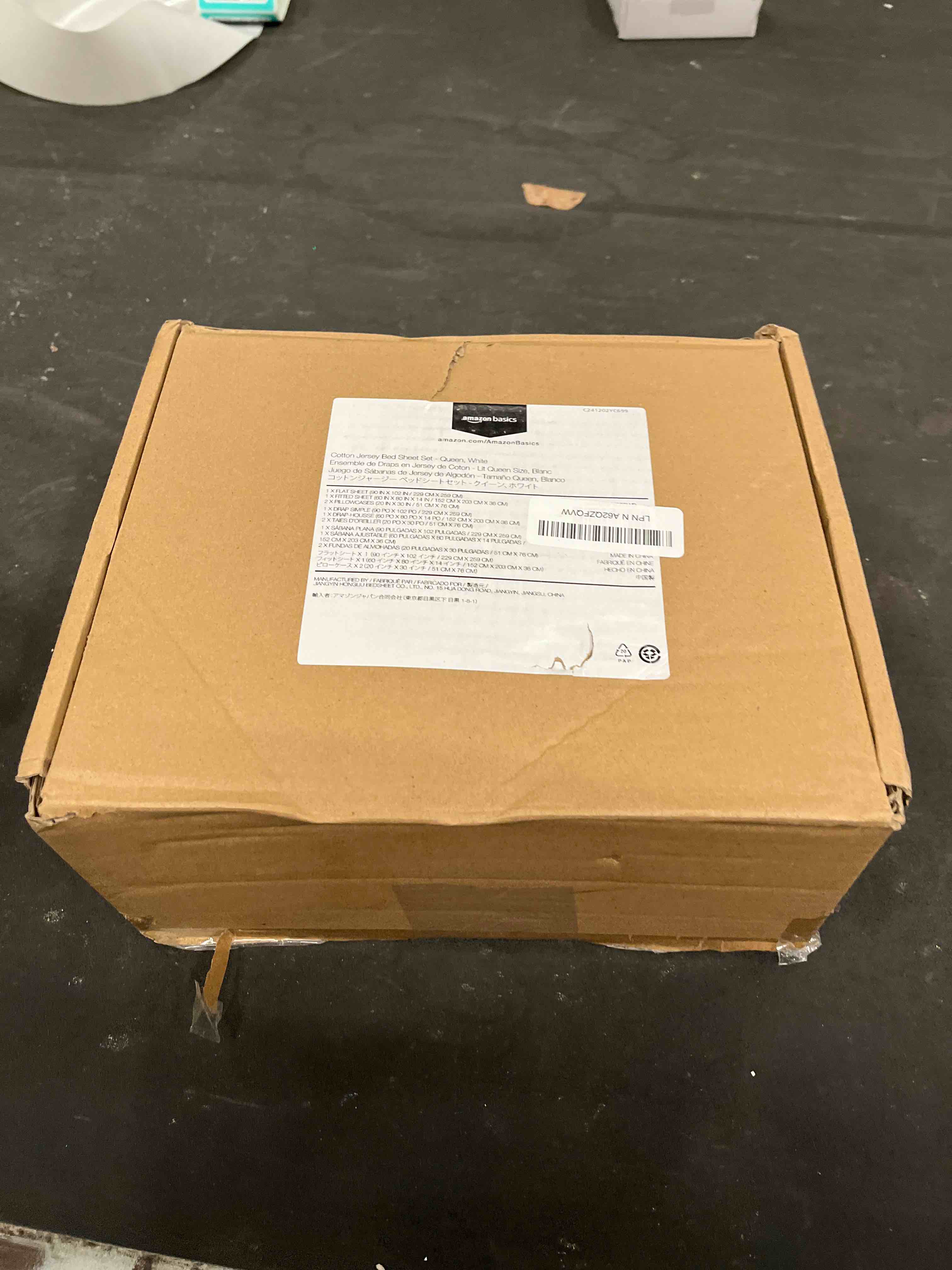 Condition photo showing Good Condition for Amazon Basics 4 Piece Comfortable Cotton Jersey Bed Sheet Set, Includes Soft Flat and Fitted Sheets, Pillowcase, Queen, White, Solid Queen White