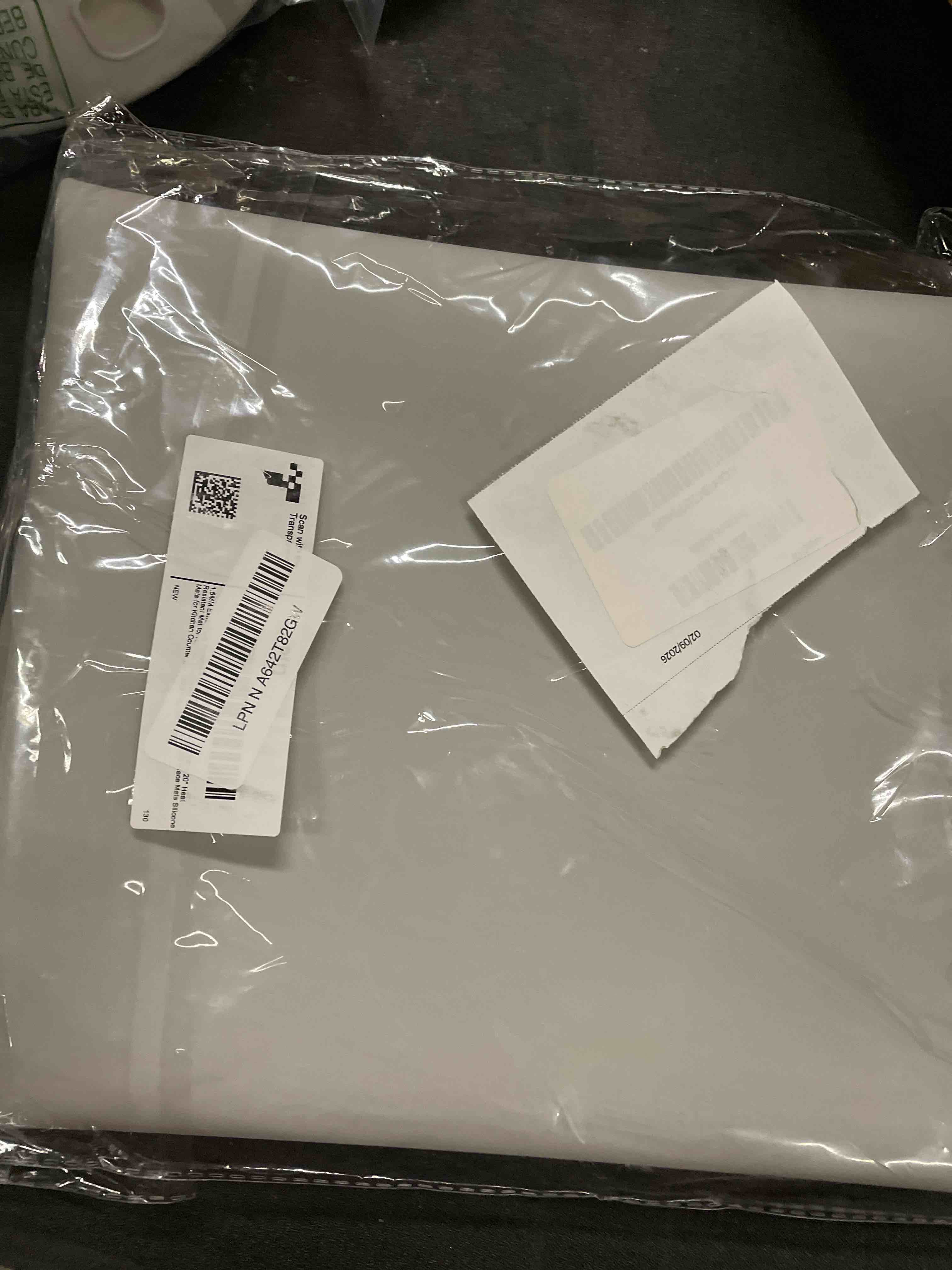 Condition photo showing Good Condition for 1.5MM Extra Thick Placemats Extra Large Silicone Mat 28" x 20" Heat Resistant Mat for Kitchen Countertop Protector, Washable Place Mats Silicone Mats for Kitchen Counter Mat Table Mat, Grey, Sapid Gray 28" x 20" x 0.06"