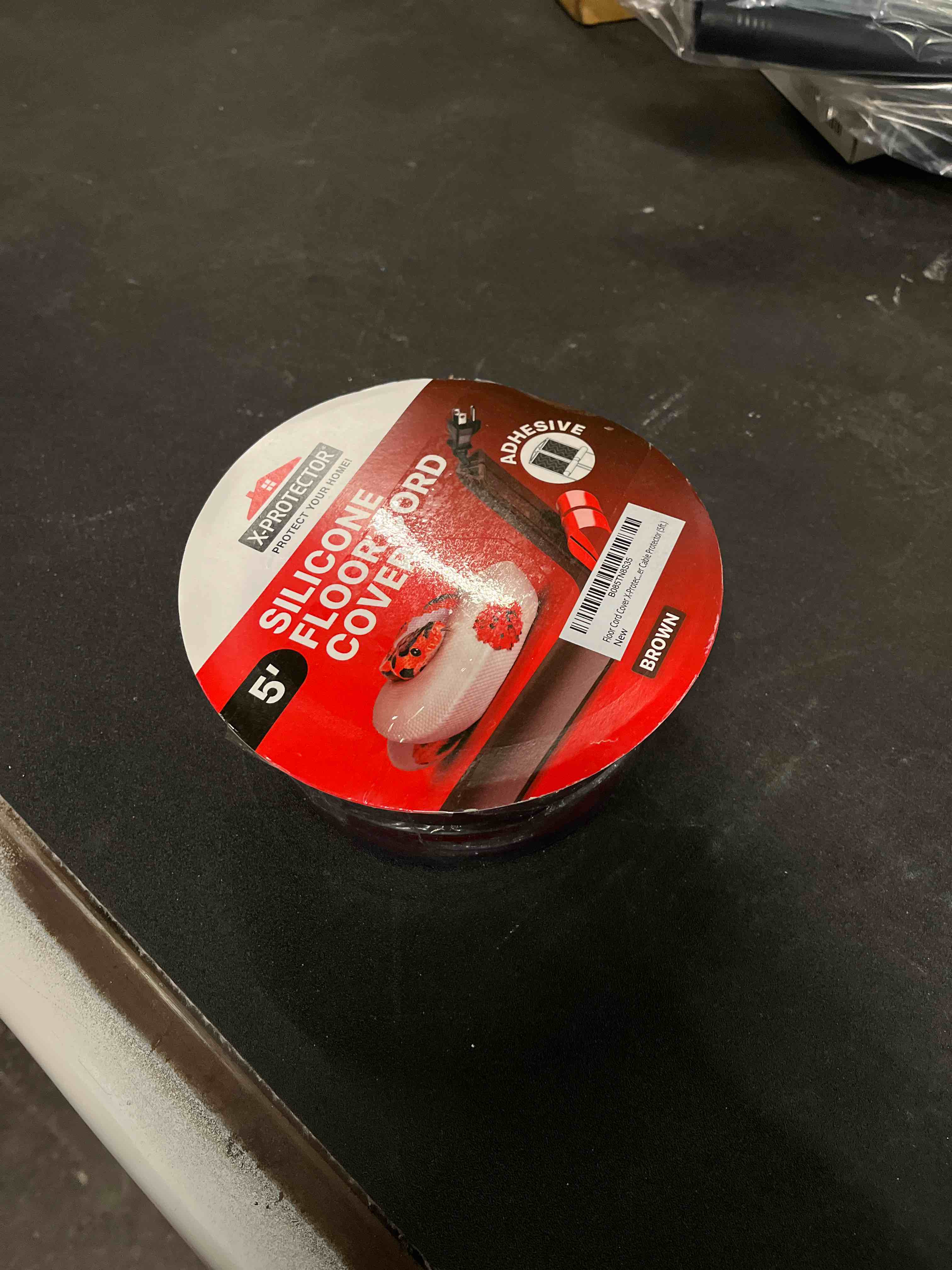 Condition photo showing Good Condition for Floor Cord Cover X-Protector - 5’ Overfloor Cord Protector - Self-Adhesive Power Cable Protector - Silicone Cord Protector - Ideal Extension Cord Cover to Protect Wires On Floor (60 in)