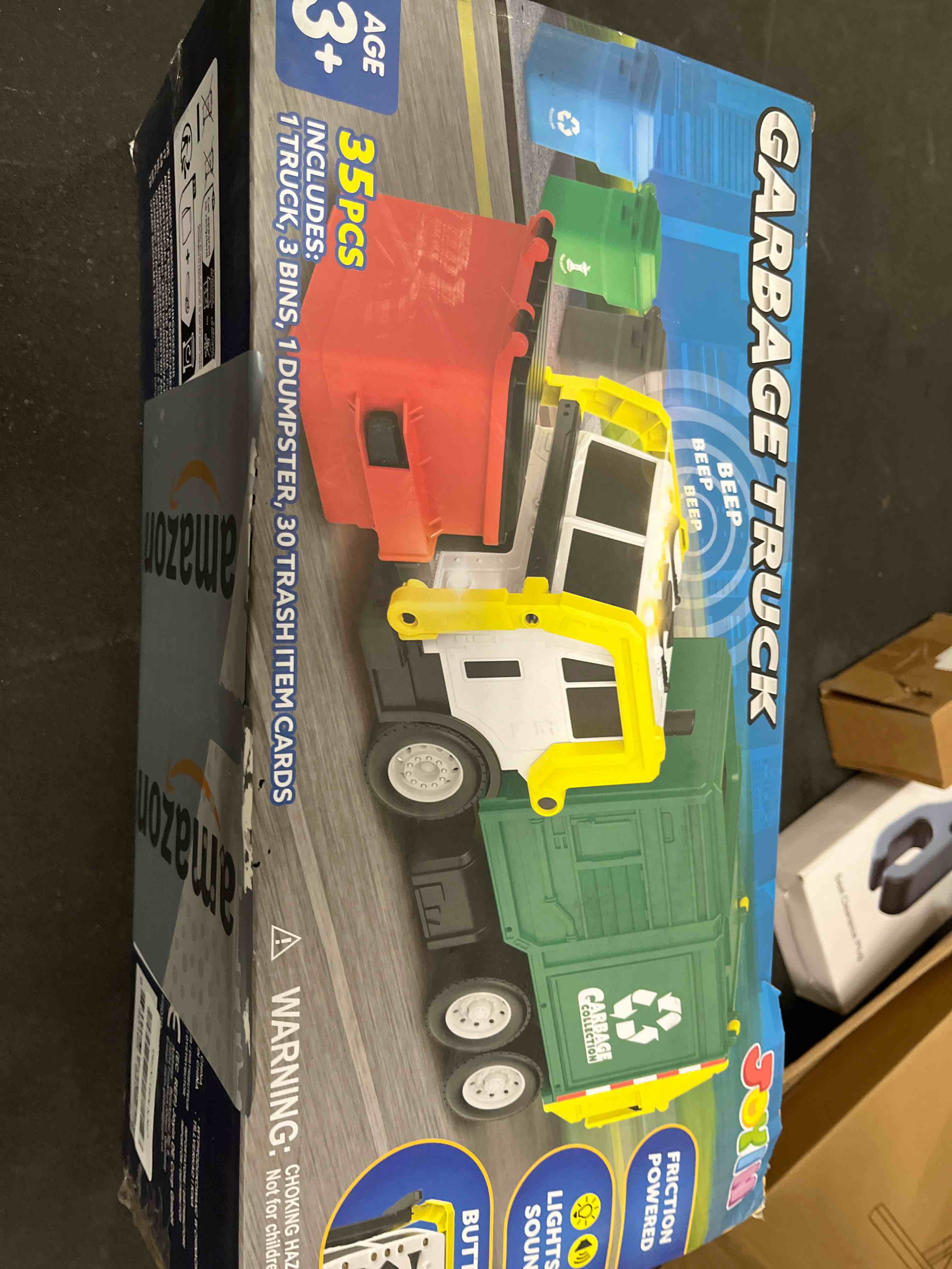 Condition photo showing Good Condition for JOYIN Large Friction Powered Garbage Truck Toy Set, Includes Dumpster, Trash Bins, and Learning Cards for Kids, Boy Toys Birthday Gift for Boys Girls Kids Toddler Gift of Easter Basket Stuffers Green