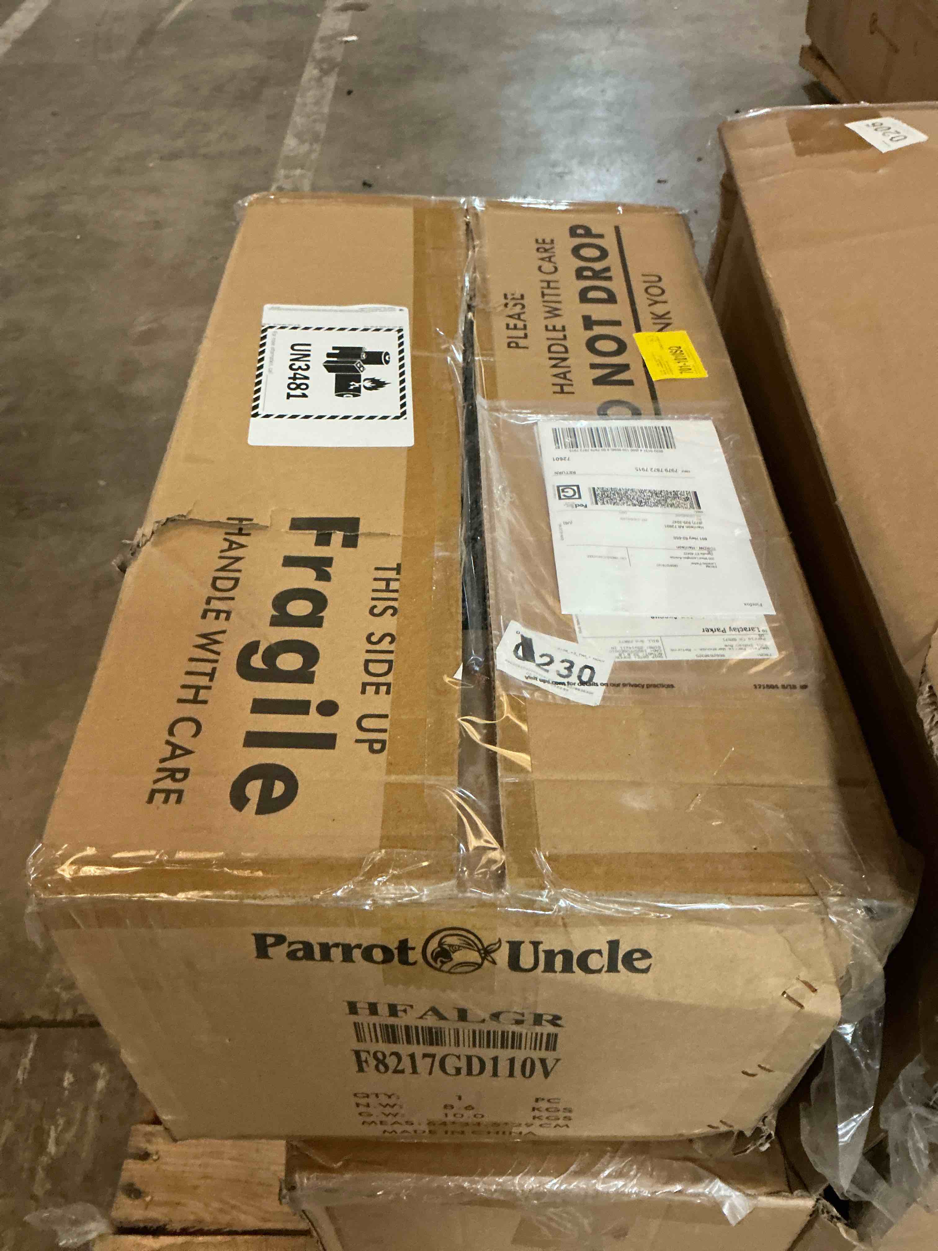 Condition photo showing As Is for (damaged )trosclair 60'' 8- blade reversible dc ceiling fan with led lights and remote control