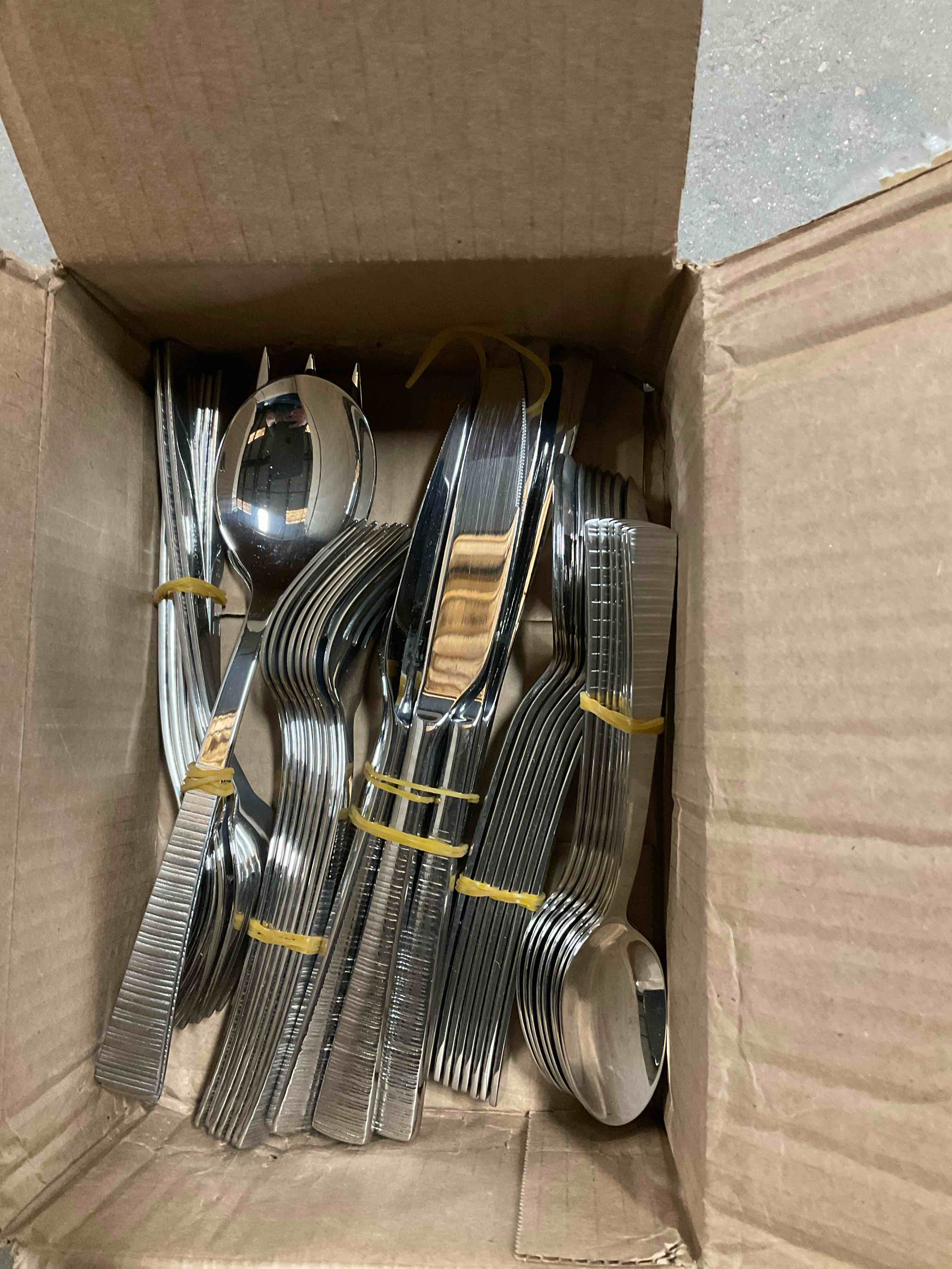 Condition photo showing Good Condition for 48 PIECE MODERN SILVERWARE SET