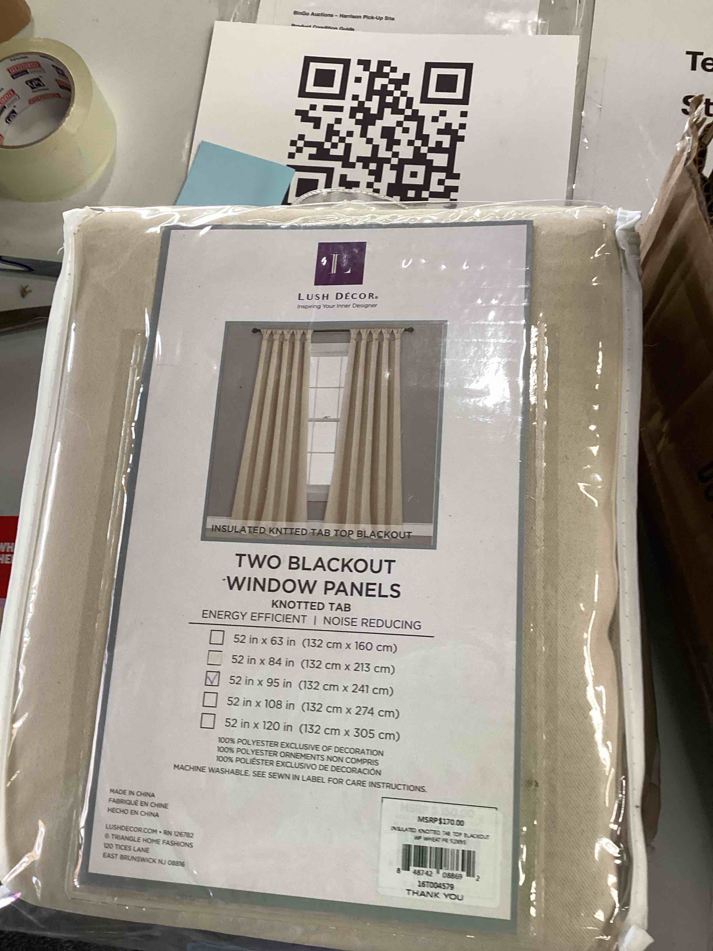 two blackout panel curtains. beige 
