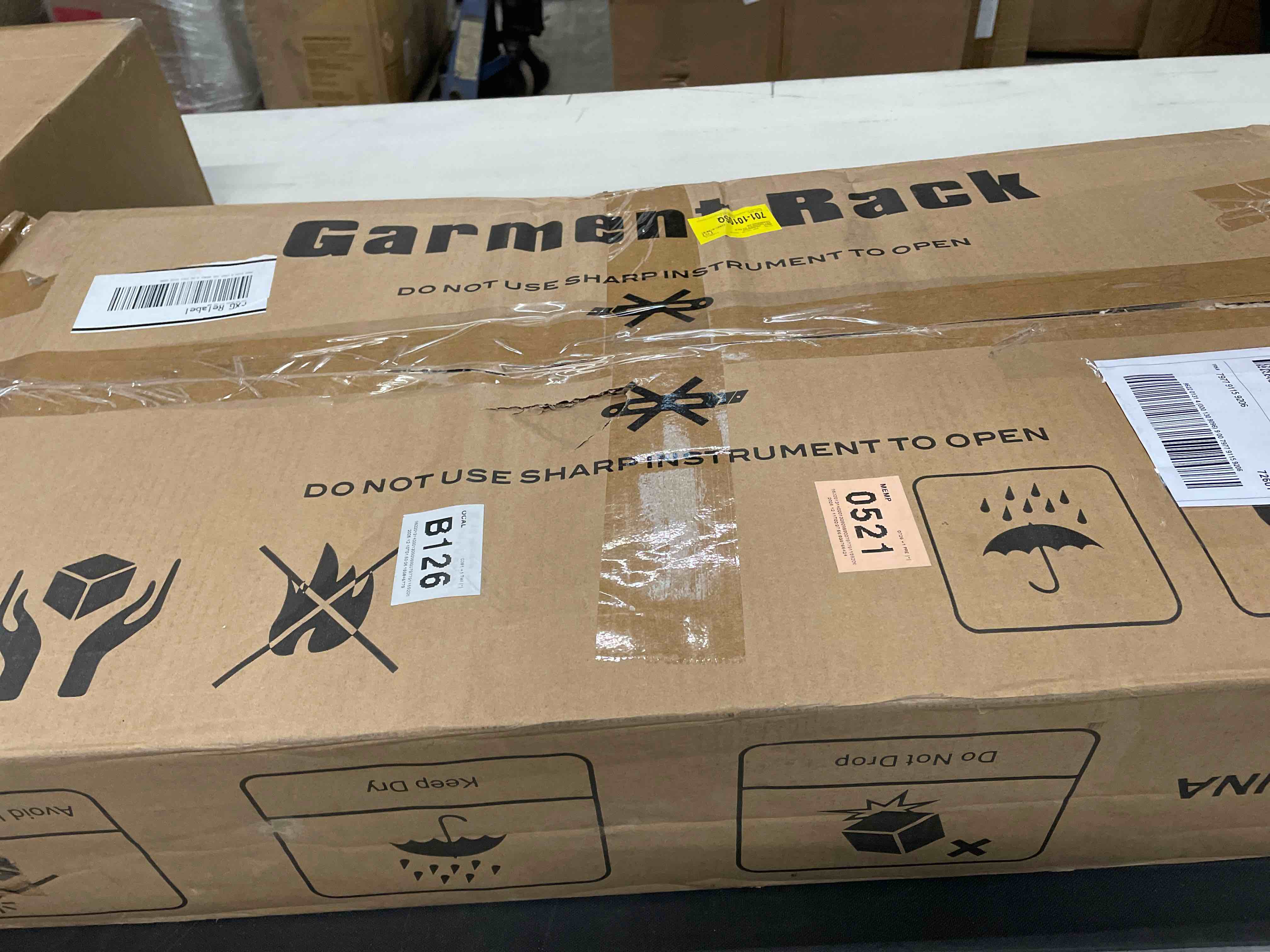 Condition photo showing As Is for Rylaey 47.24\u0027\u0027 Metal Clothes Rack, Heavy Duty Garment Rack for Hanging Clothes, Industrial Clothing Racks with Shelves, 2 Fabric Drawers, 4 Hooks, 2 Hanging Rods, Freestanding Closet Organizer