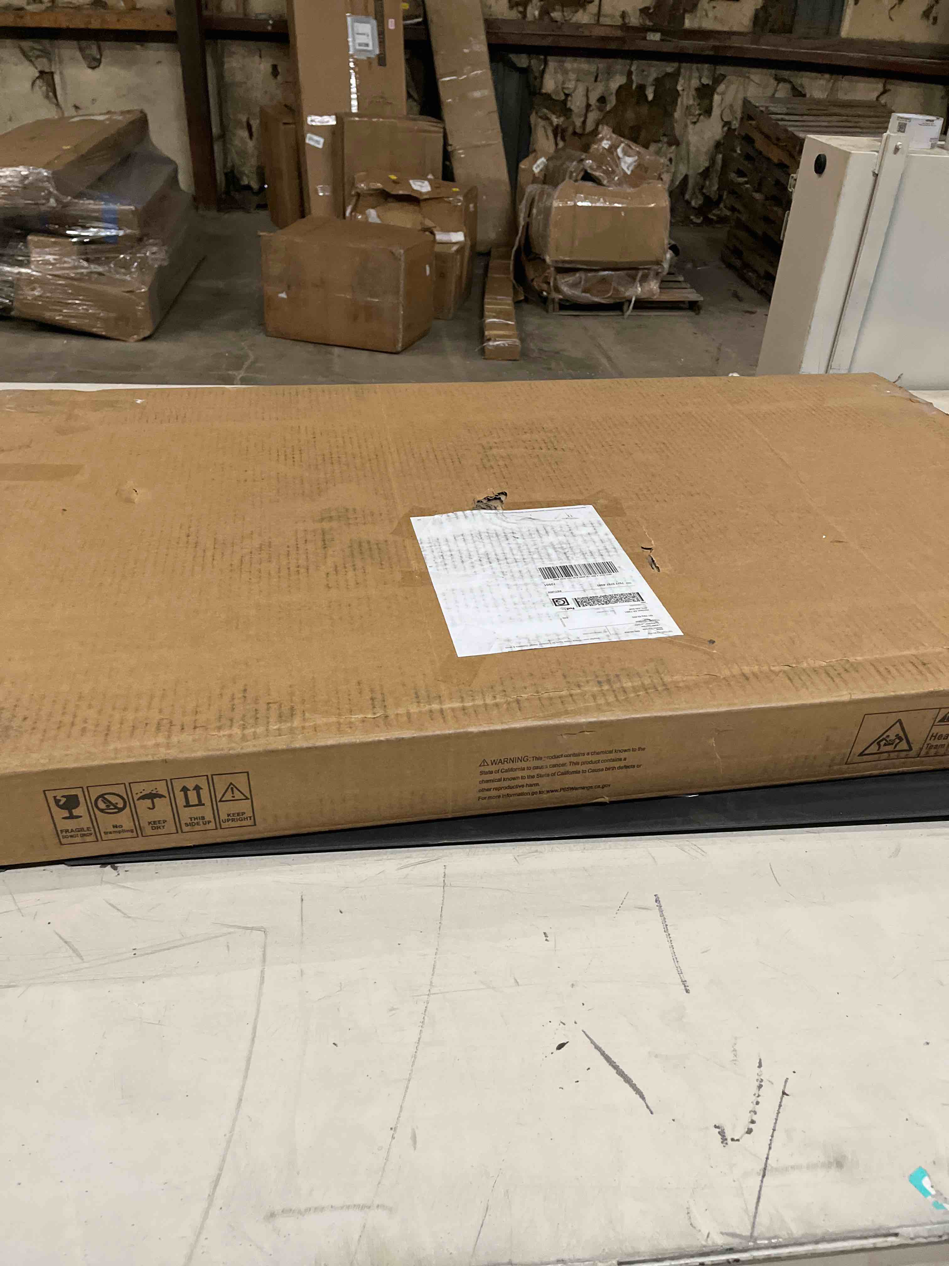 Condition photo showing As Is for Luxury White Oval Coffee Table with Musical Note Base–Modern Accent Piece for Living Room Decor