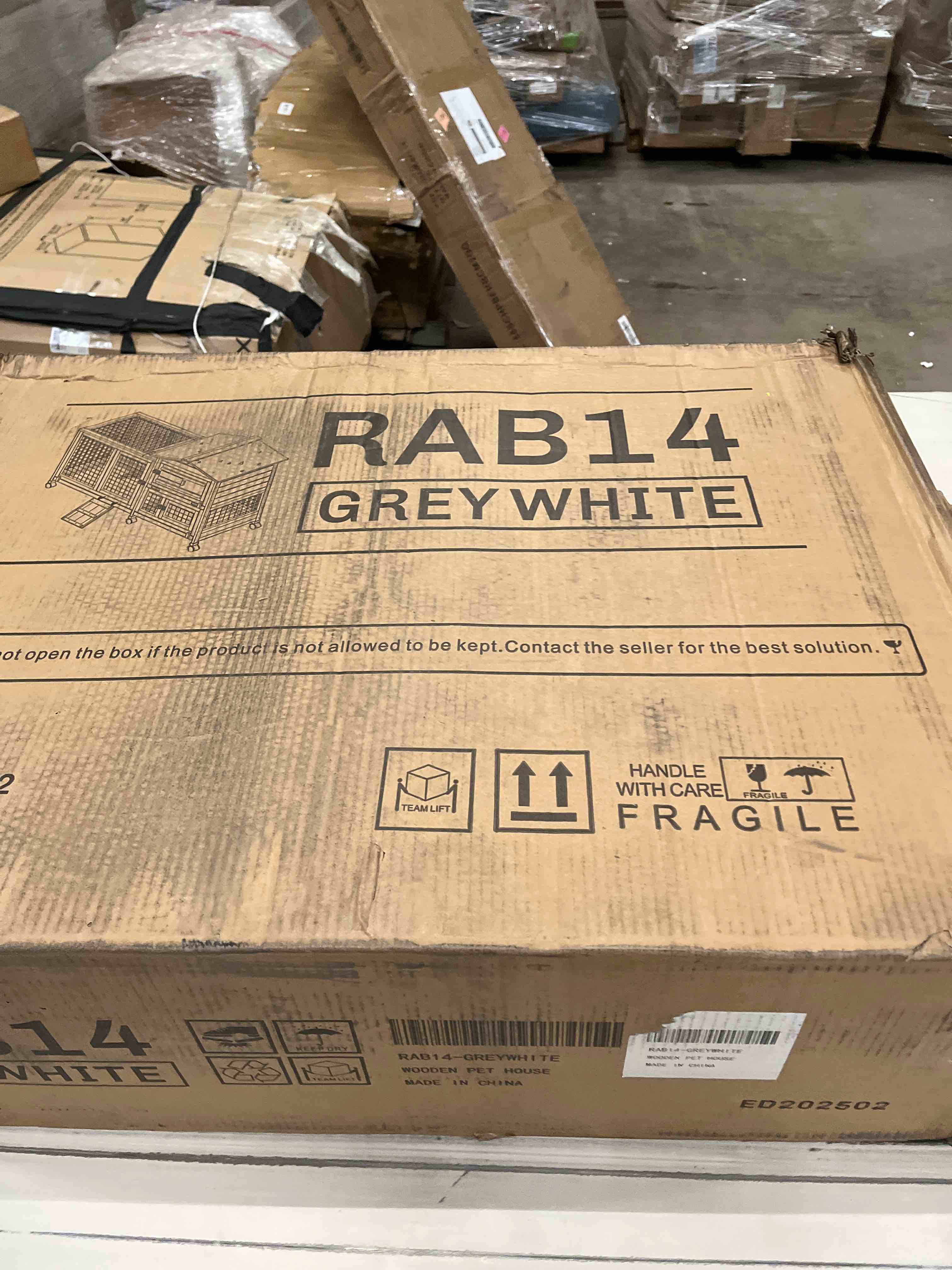 Condition photo showing As Is for Bremond Rabbit Hutch With Wheels