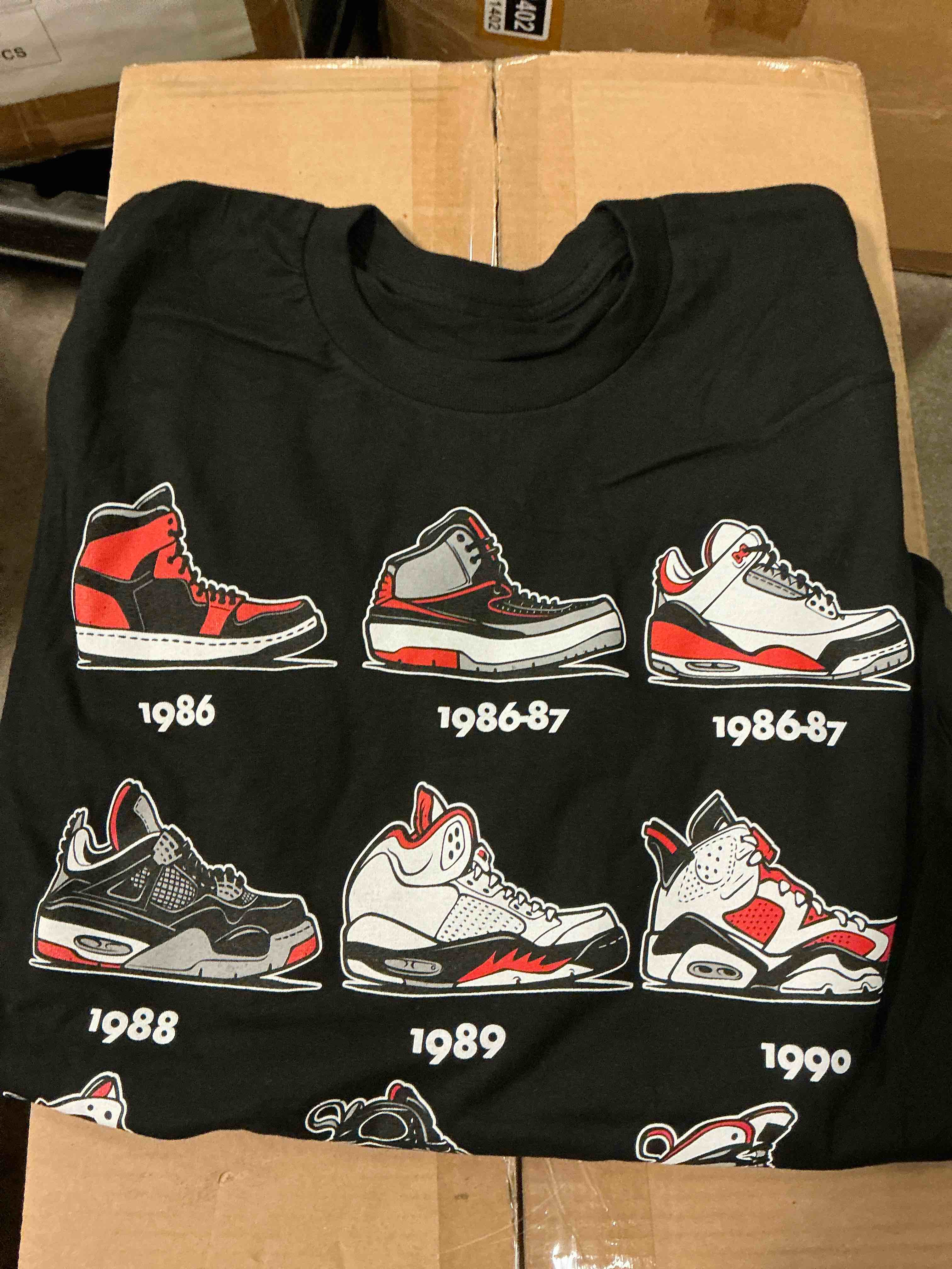 assortment of shirts of different styles and sizes and colors (1 box gets 30 pieces)