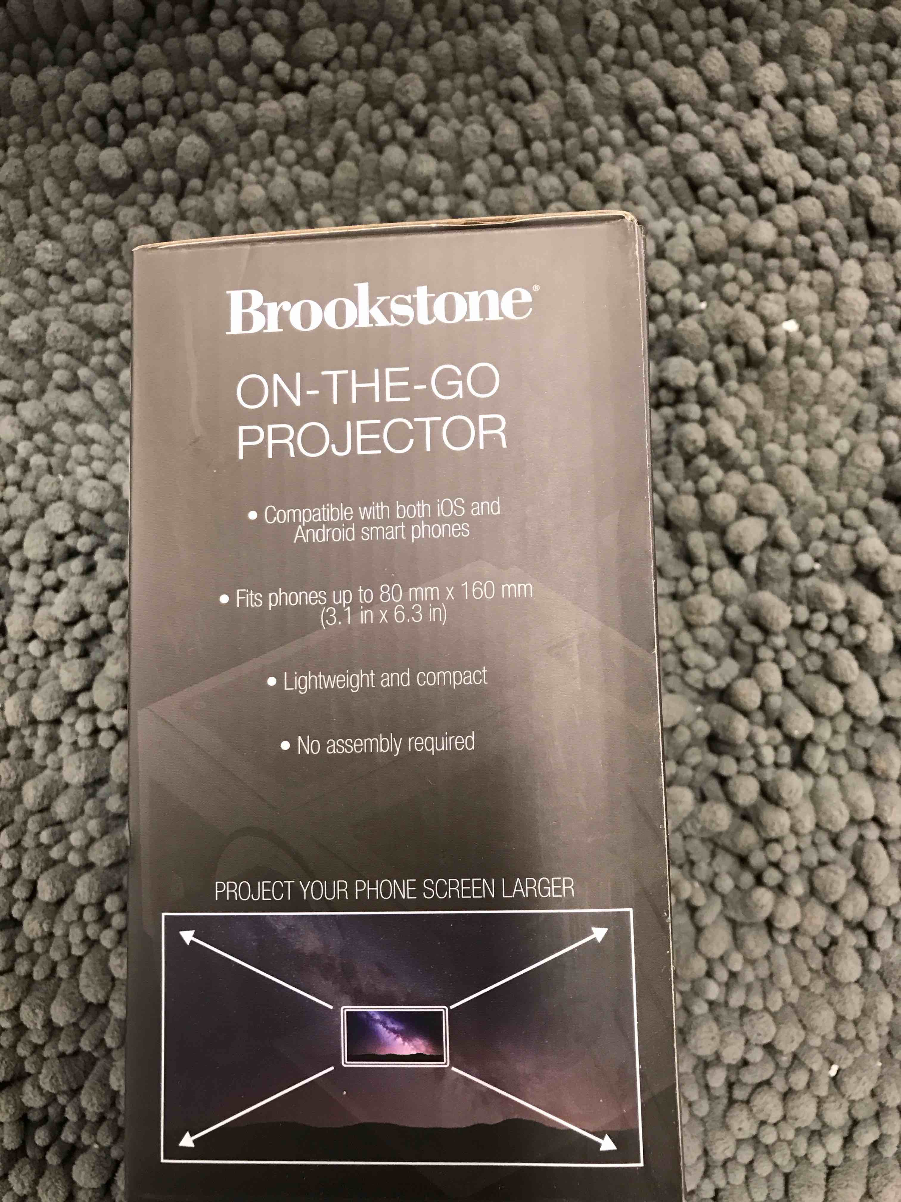 Condition photo showing Good Condition for Brookstone On the Go Projector
