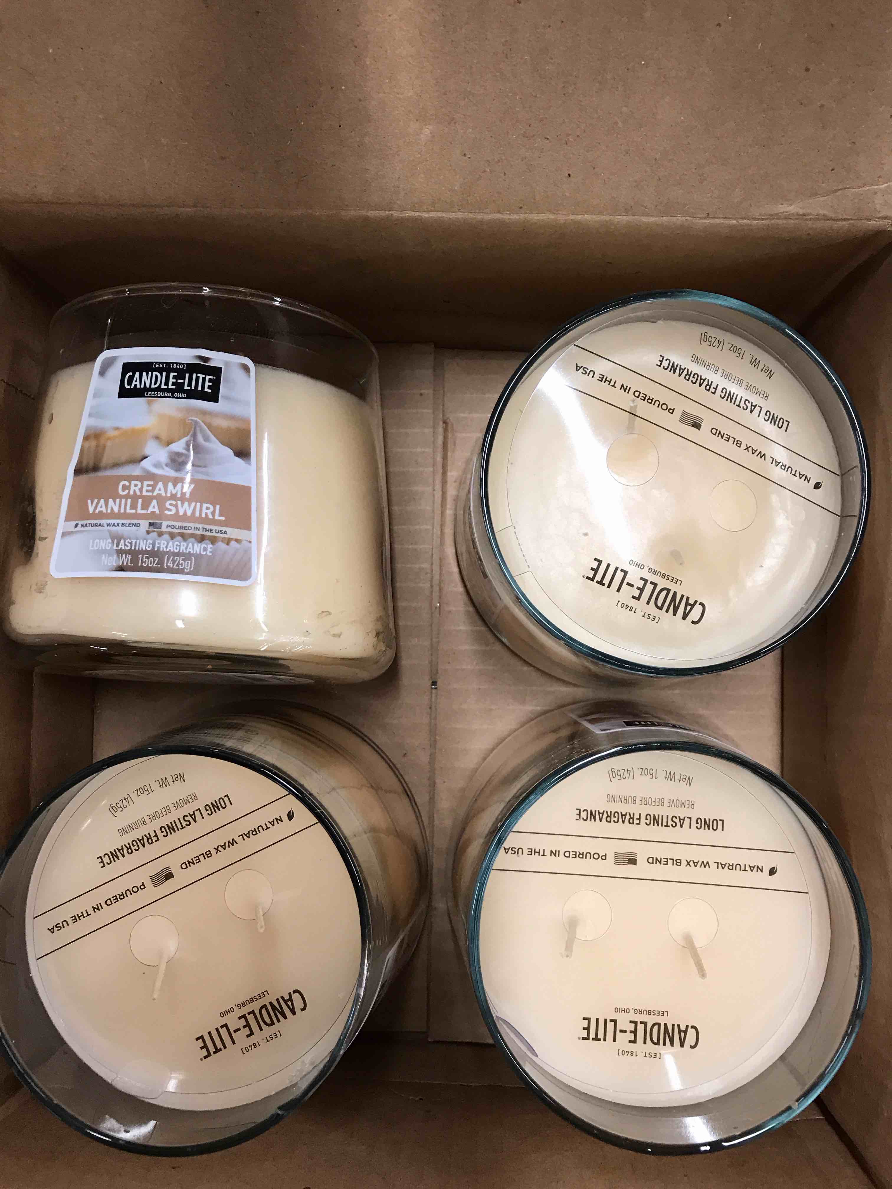 Candle-Lite Creamy Vanilla Swirl.     Set of 4