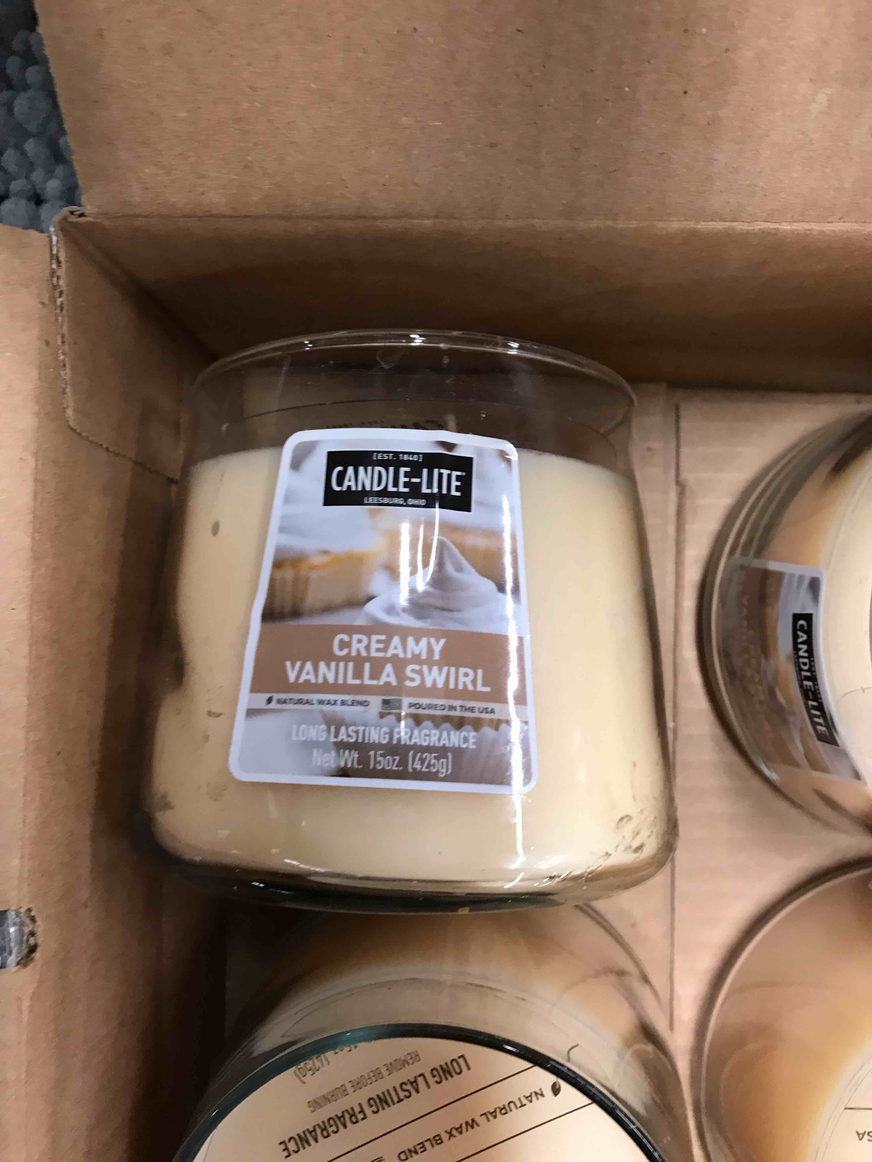 Condition photo showing New/Like New for Candle-Lite Creamy Vanilla Swirl.     Set of 4