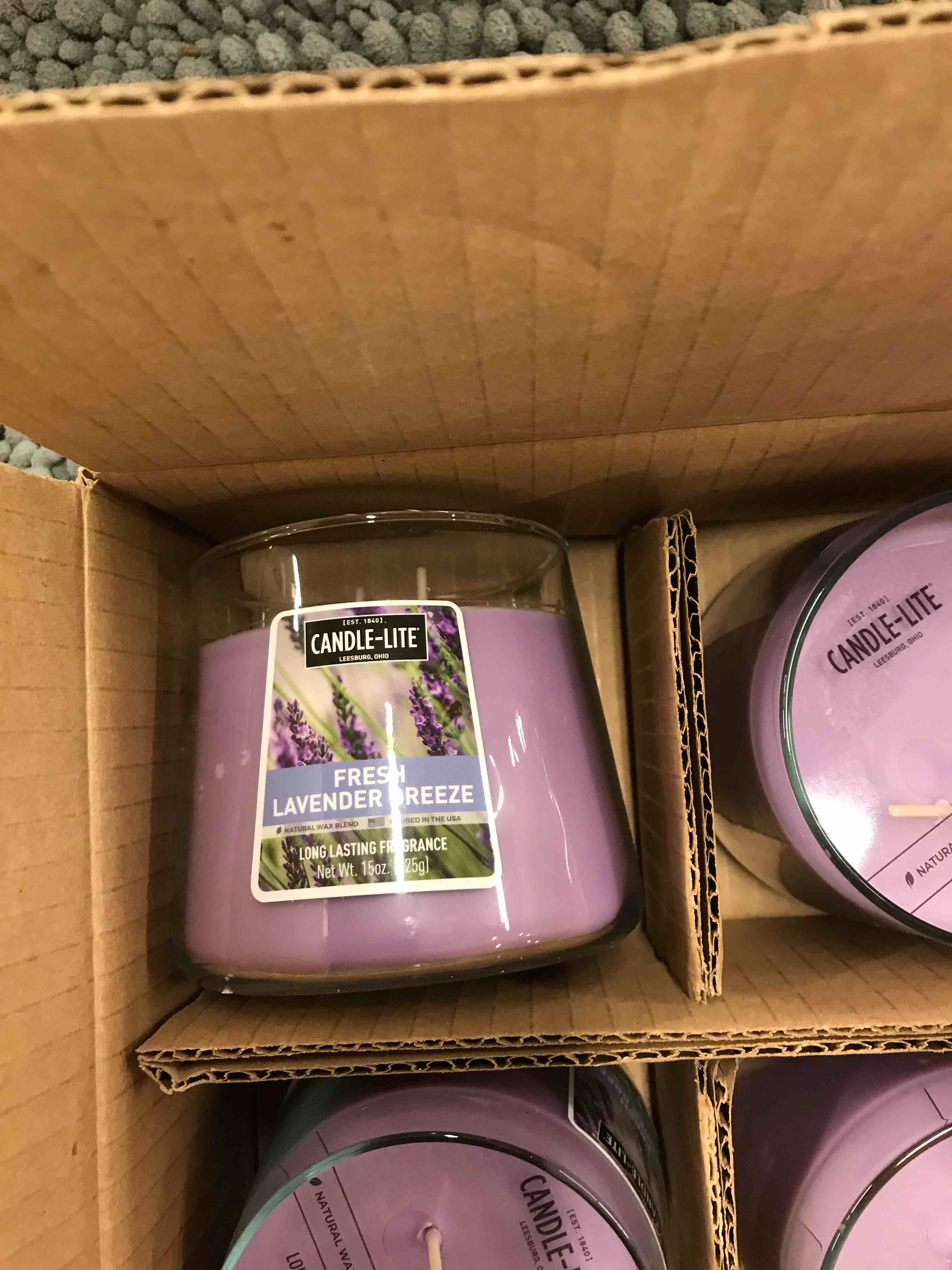 Condition photo showing New/Like New for Candle-Lite Fresh Lavender Breeze Candles.     Set of 4