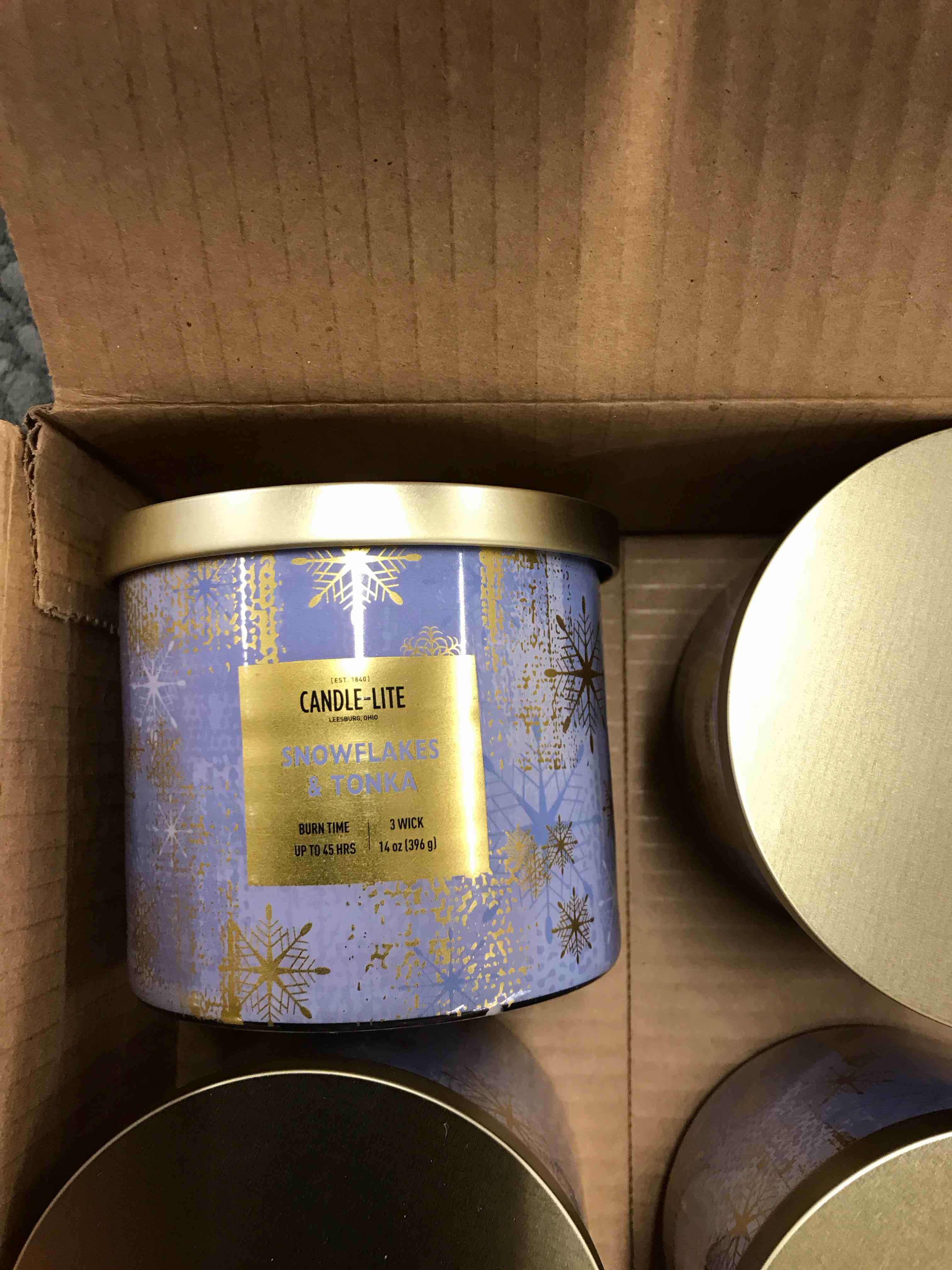 Condition photo showing New/Like New for Candle-Lite Snowflakes and Tonya Candles. Set of 4